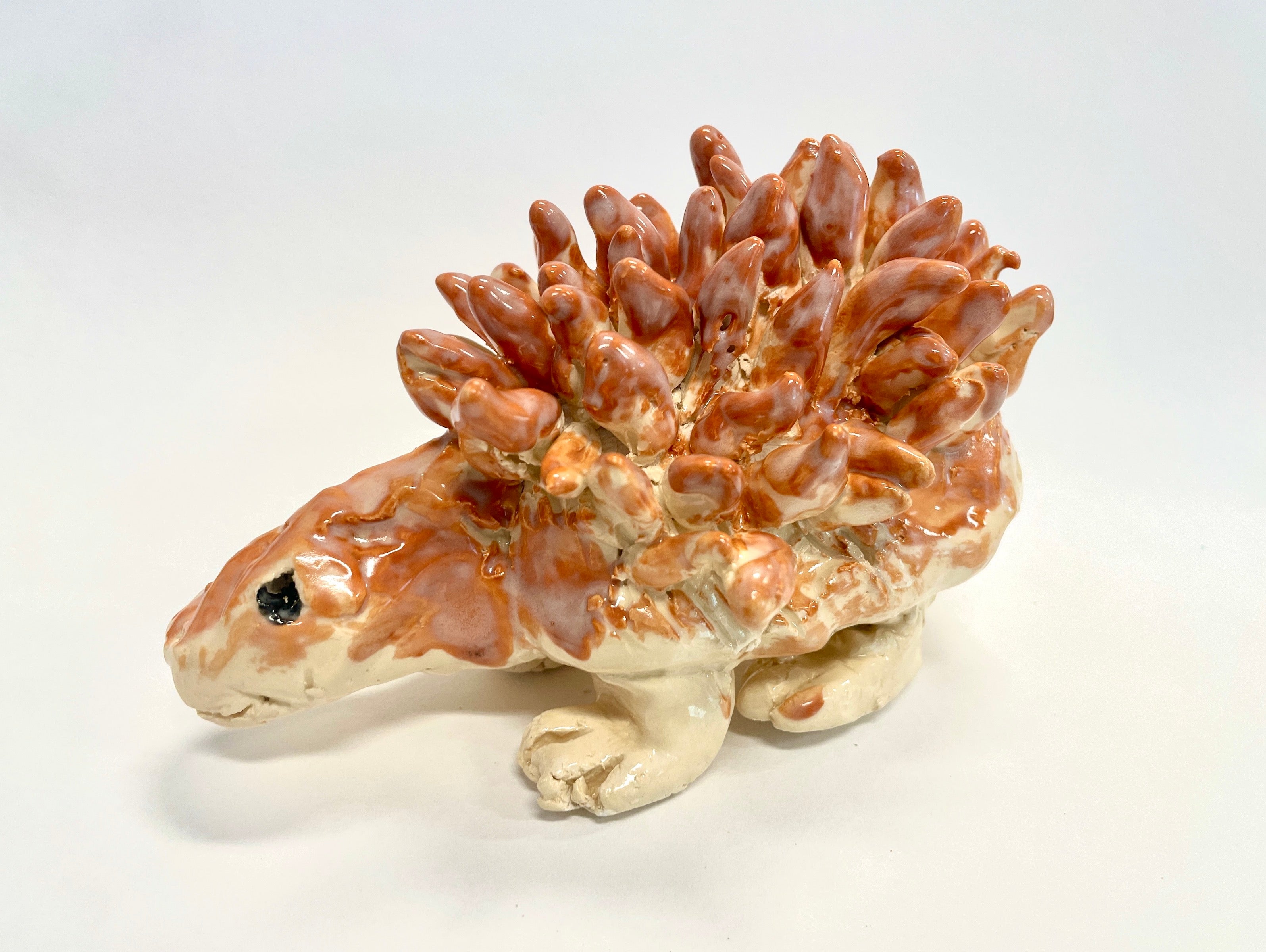 Students created ceramic animals by researching animals and their textures. 