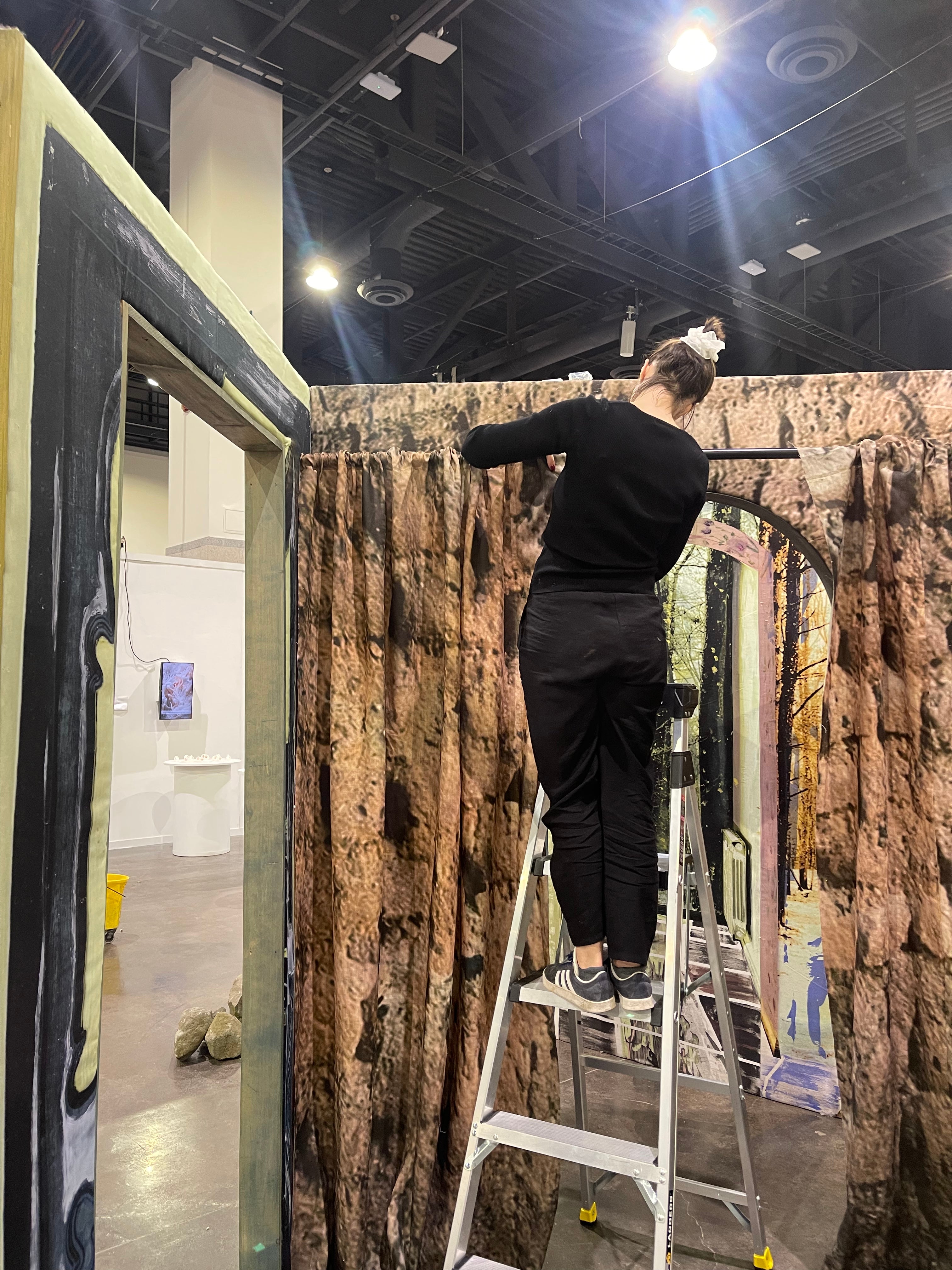 Making sure the curtain looks good!