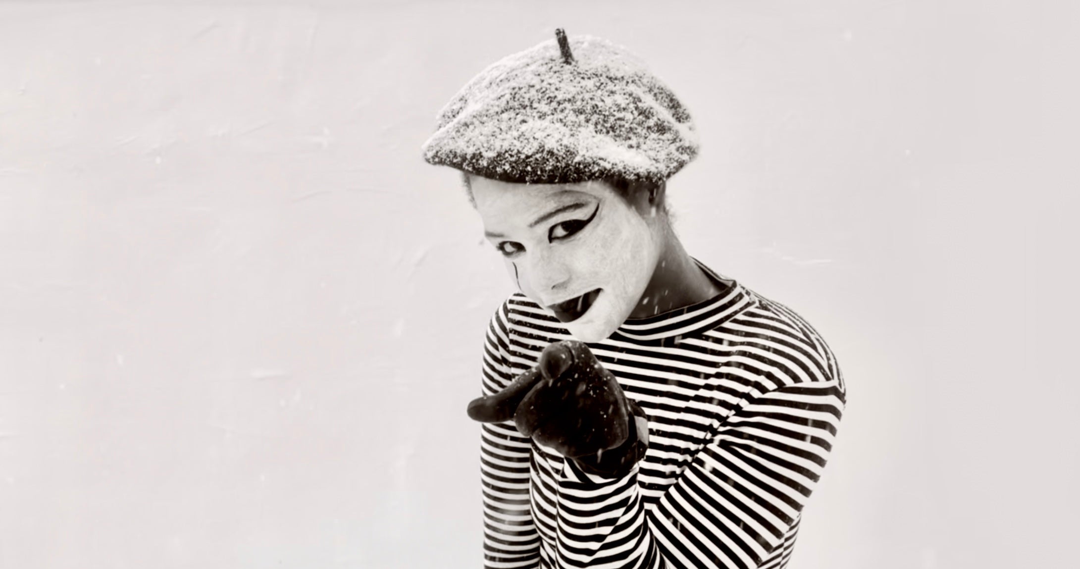 Image of a mime pointing at the viewer