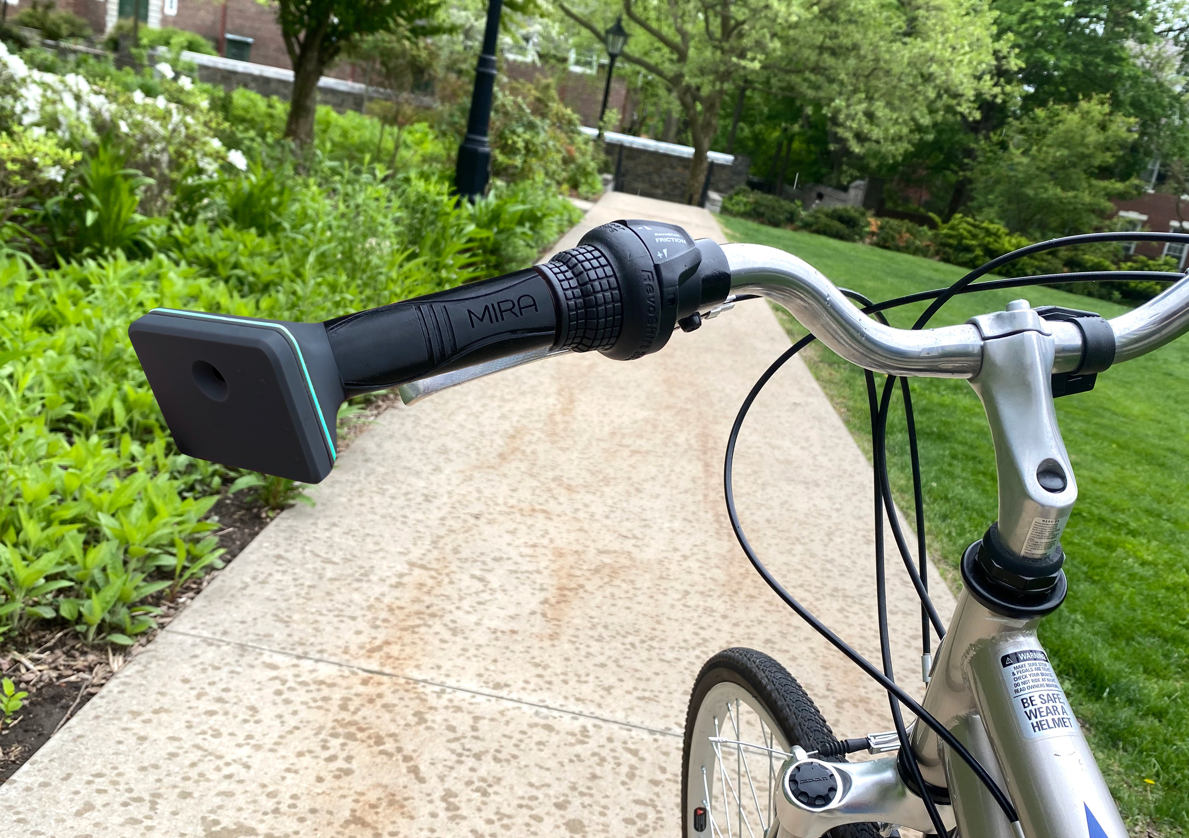 MIRA, a machine vision haptic handlebar grip mounted on a bicycle. 