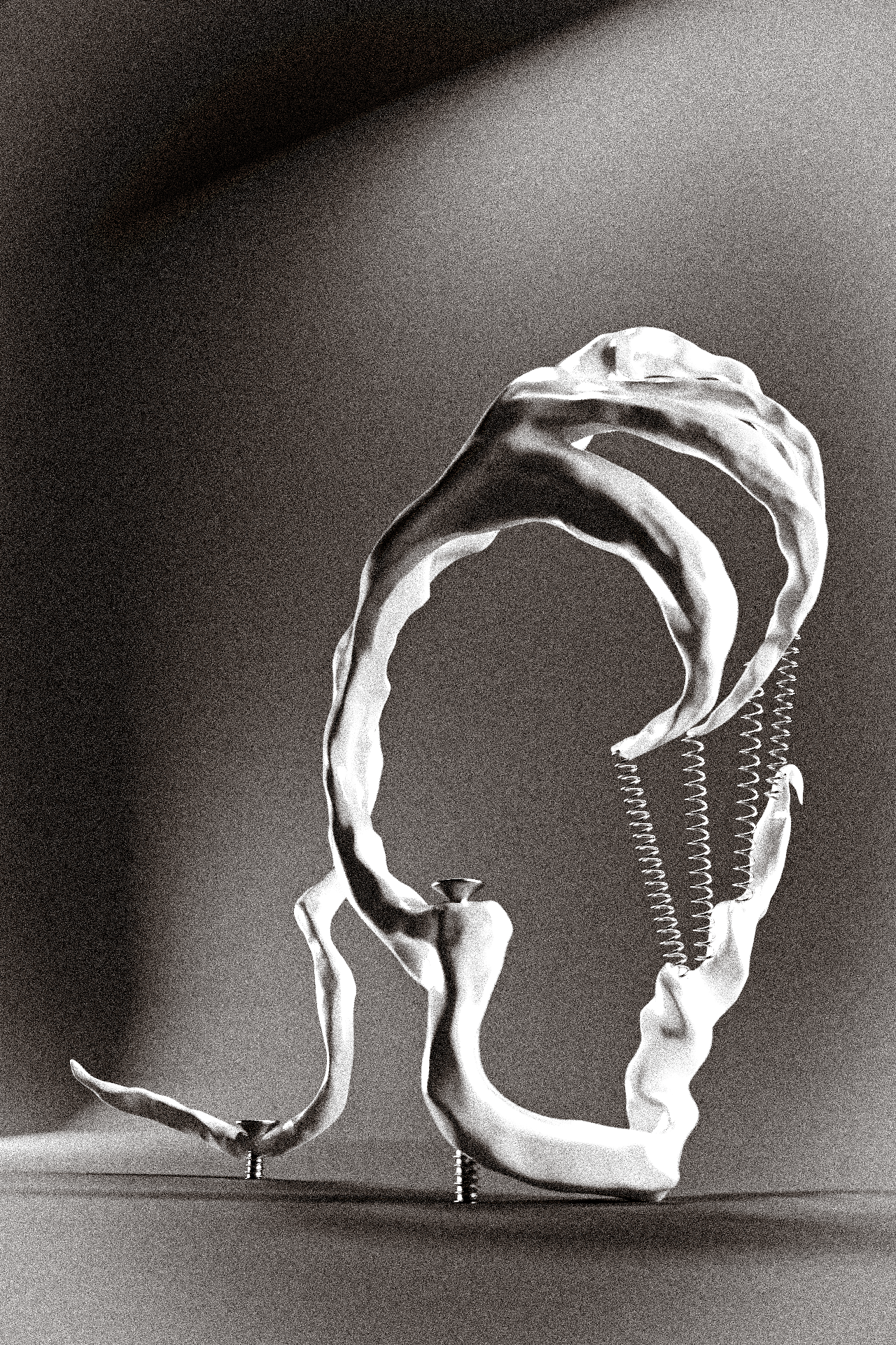 a sculpture, a fictional skeleton, springs, screws