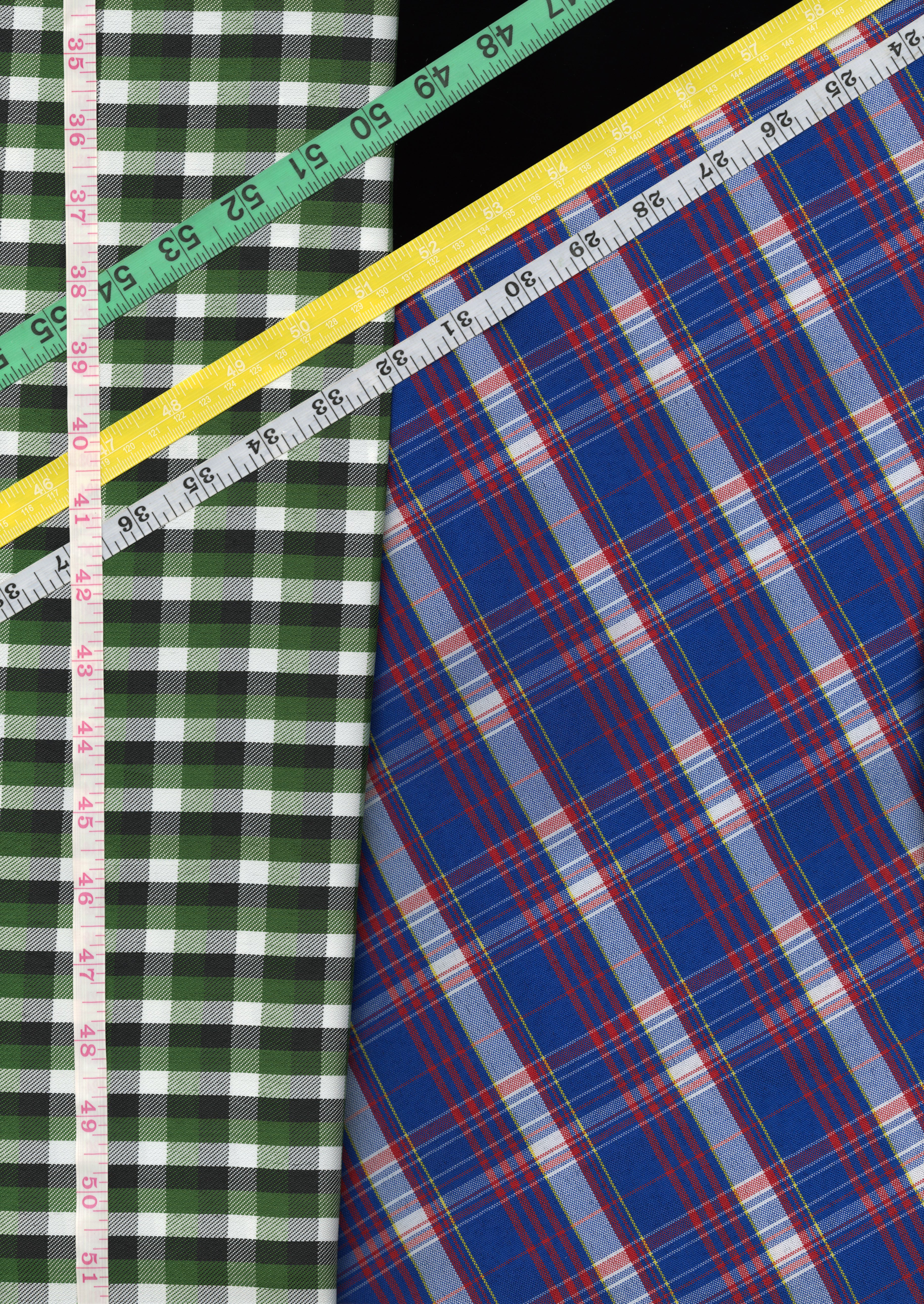 close-up of plaid patterns and rulers