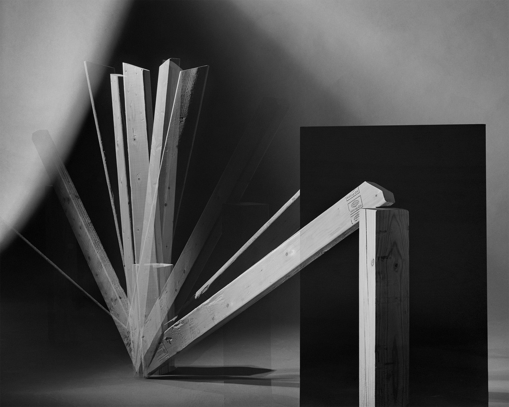 A 2x4 photograph made to look like a fan in motion. 