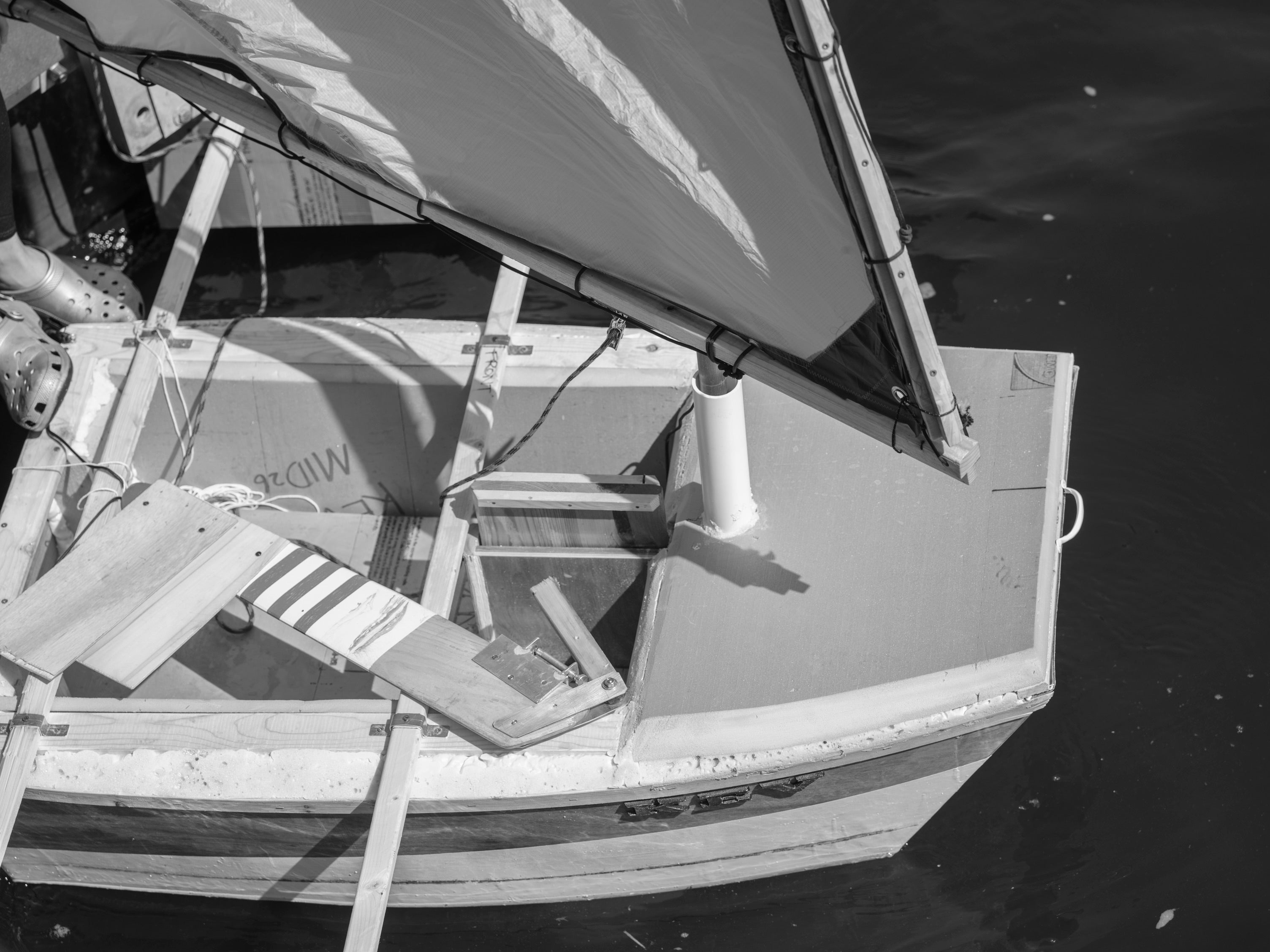 close-up black and white shot of a dinghy