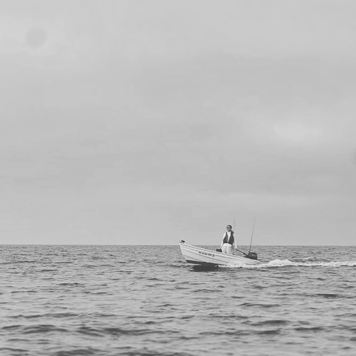 black and white shot of a dinghy