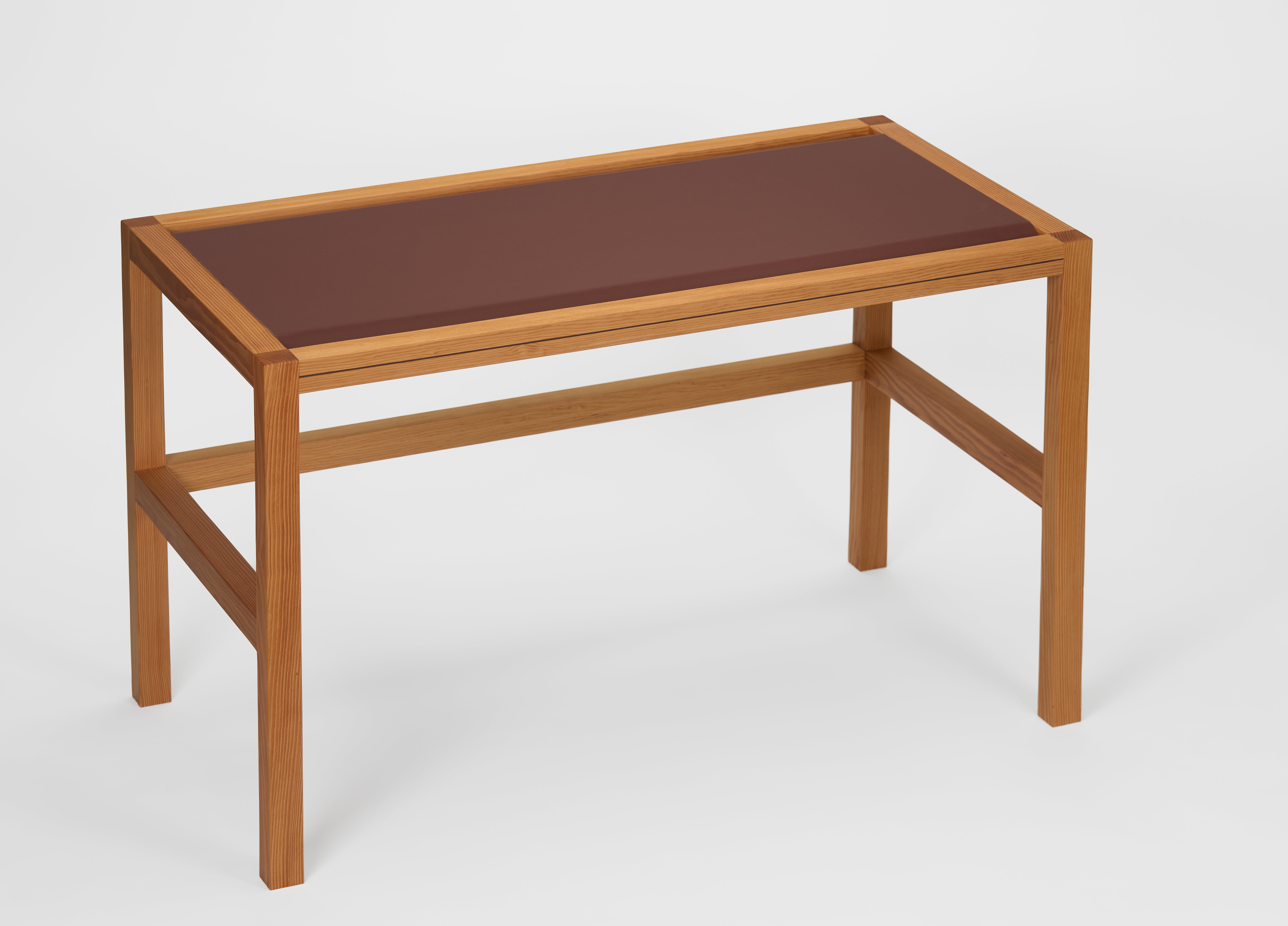 Table with woven linoleum component that creates end pockets 