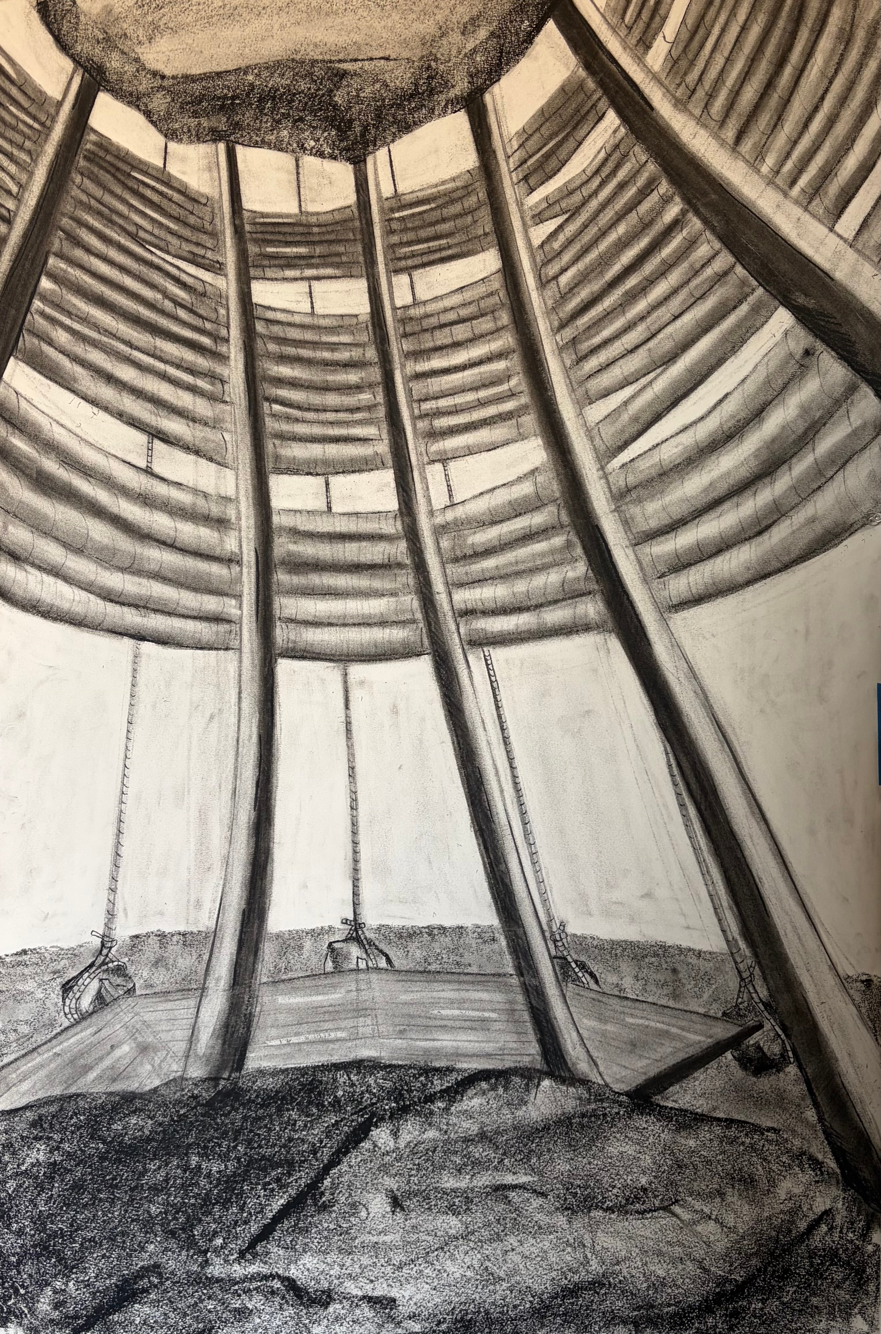 Charcoal drawing looking up at a rock being held high in the air with wood posts and rope.