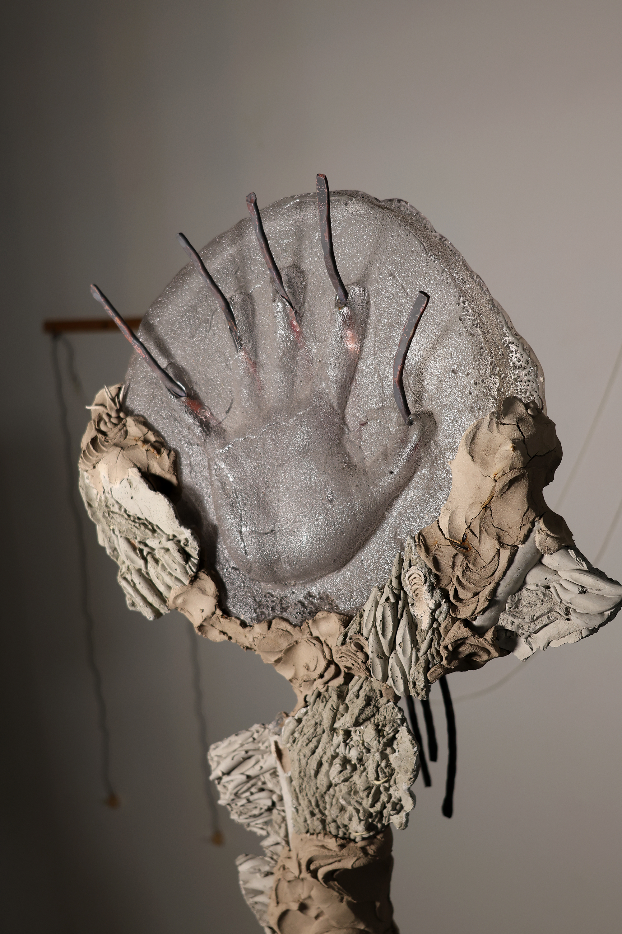 Cast glass hand with copper wire