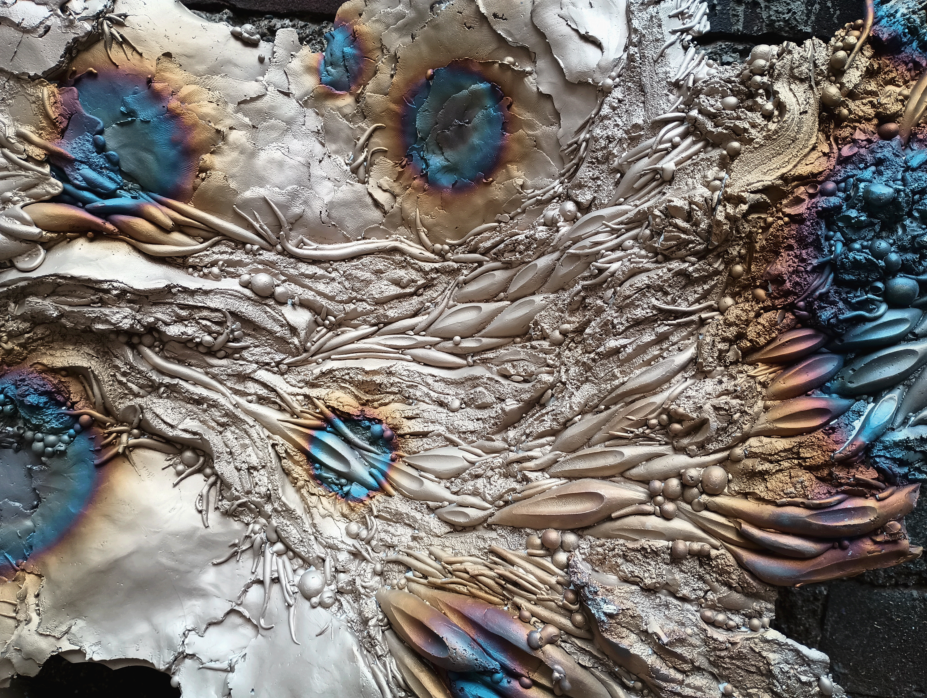 Bronze in progress, detail. Cast bronze with heat auroras.
