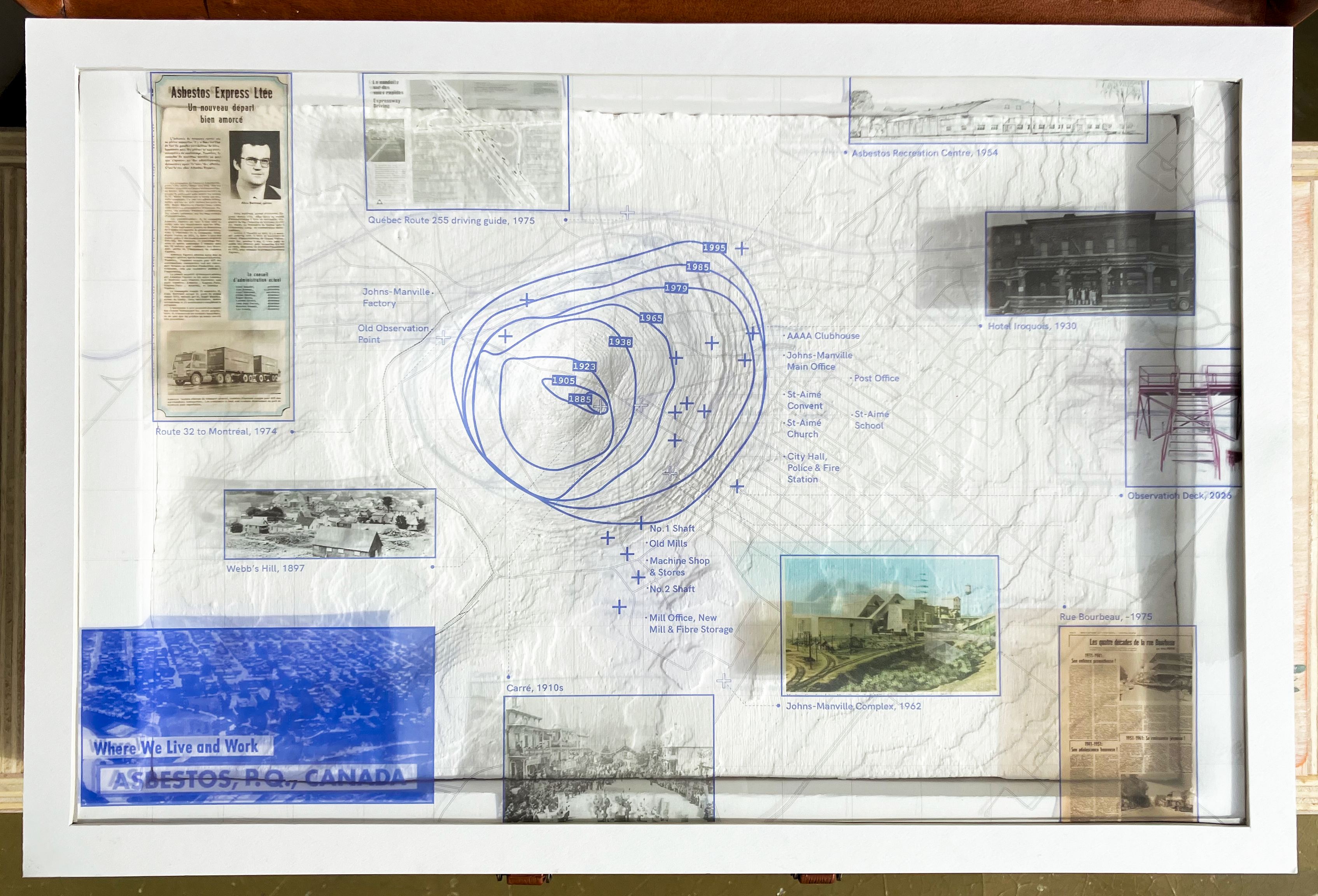 A mapping of "Where We Live and Work" printed on clear film as a narrative plate to be placed on top of the CNC model.