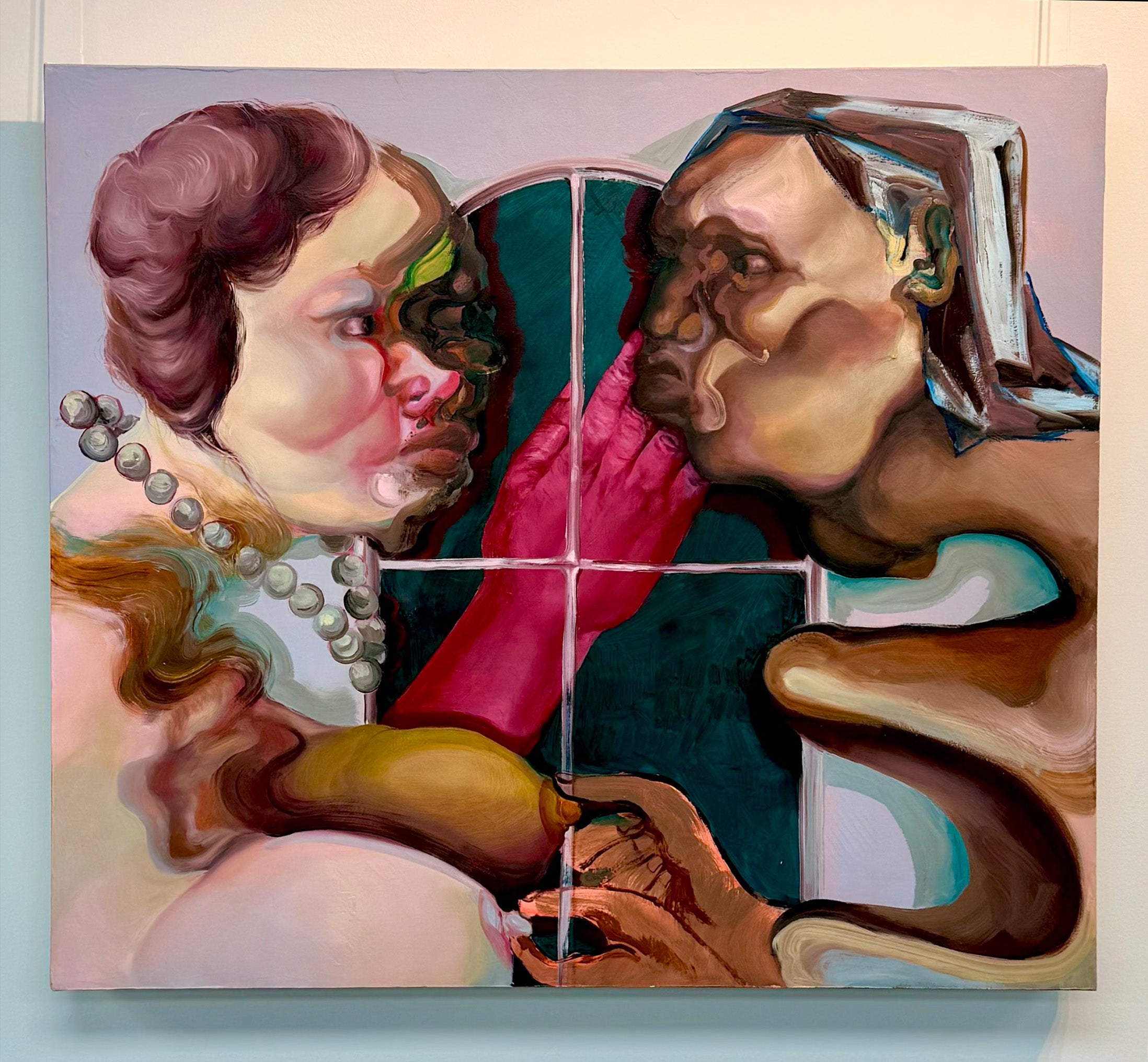Two figures facing one another in front of a pastel purple window. A red praying hand is behind them. 