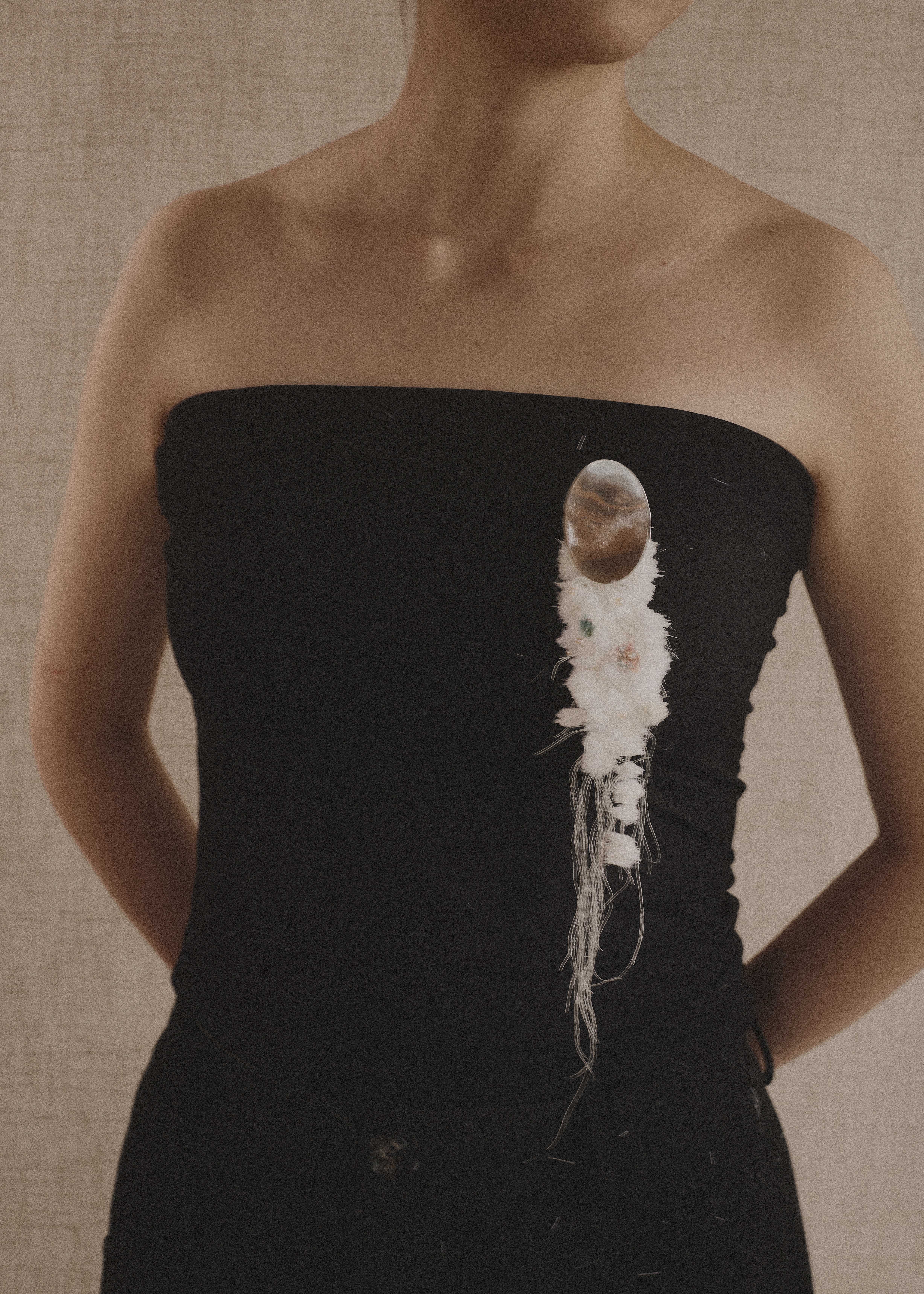 black dress with beaded broach