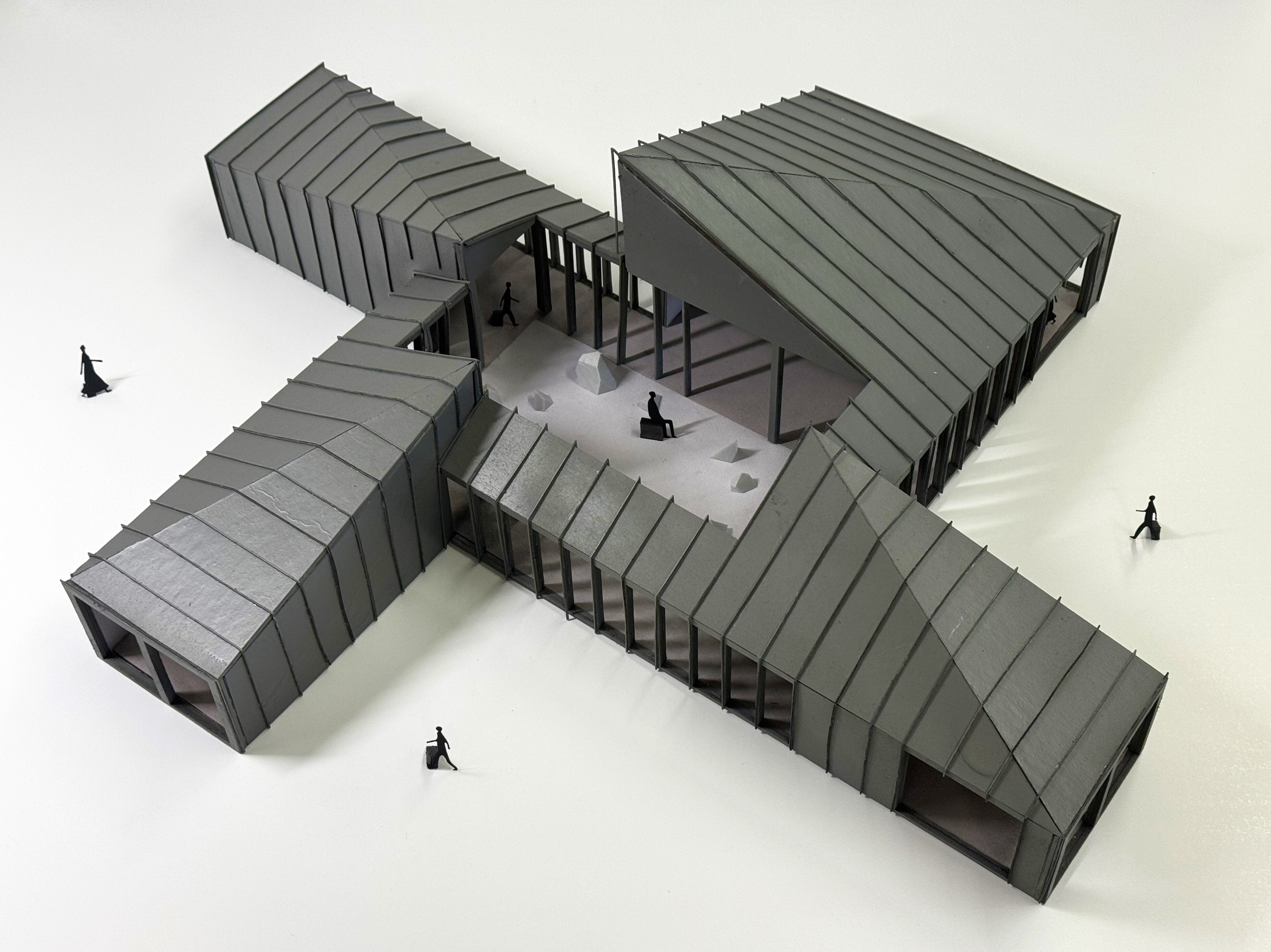 Images of architectural model of house with single sloped roofs.