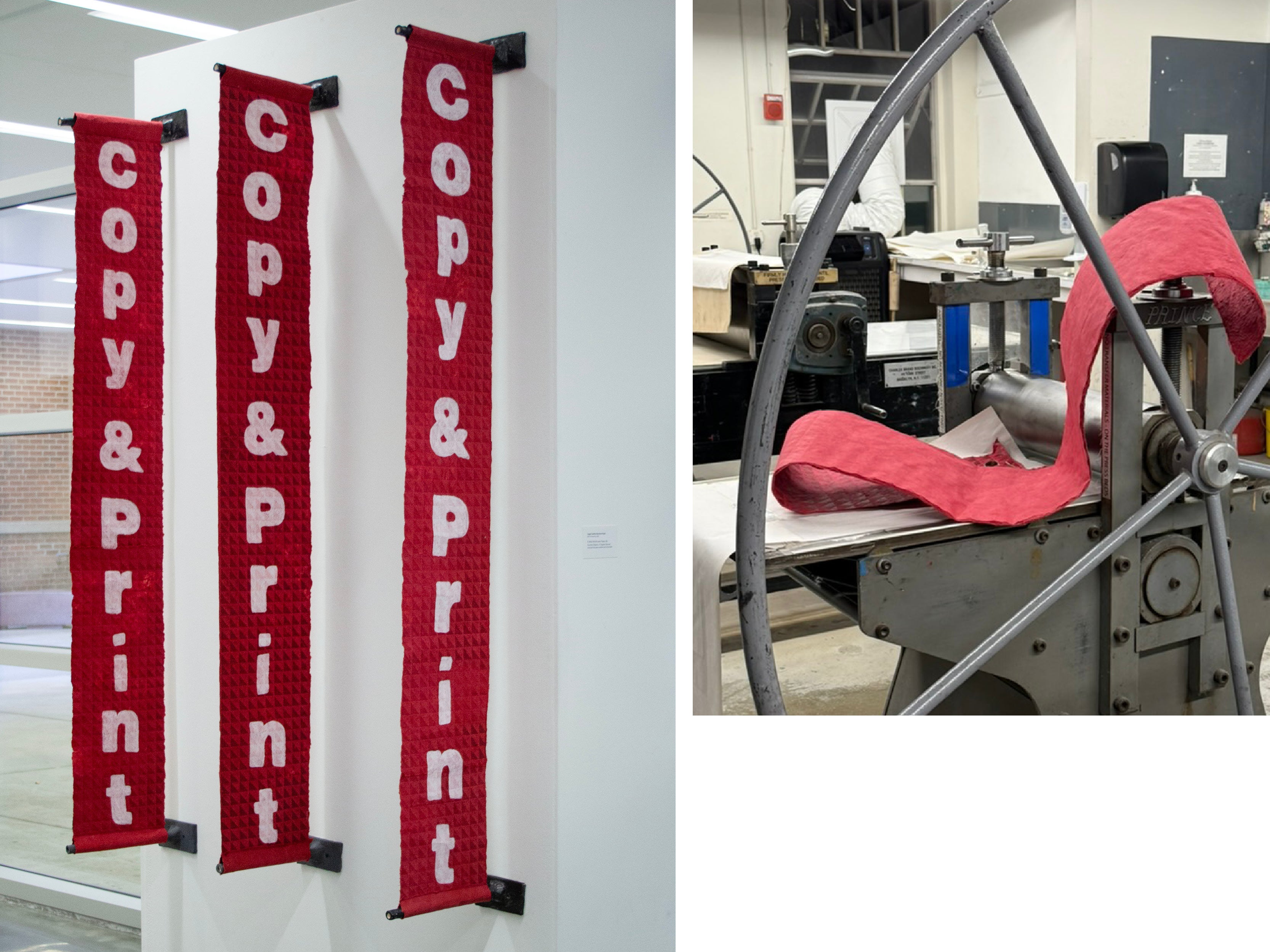 Three long red banners hang vertically on a white wall, each displaying the words ‘copy & print’ in large white letters. The banners are made of textured handmade paper and attached to black wall mounts