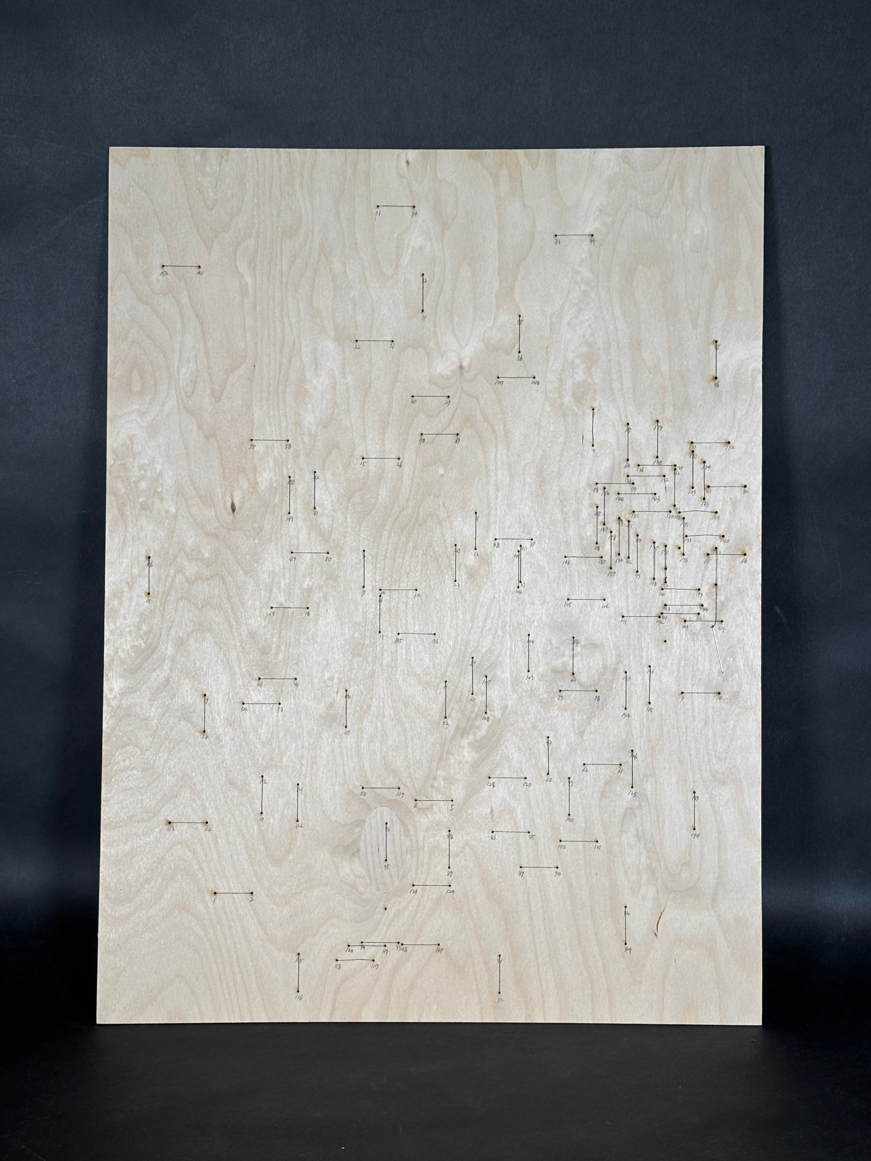 The front side reveals how orderly the stitching process can appear. Each pair of dots is connected by a one-inch line following a specific direction, while the sequence is carefully documented through numbering.