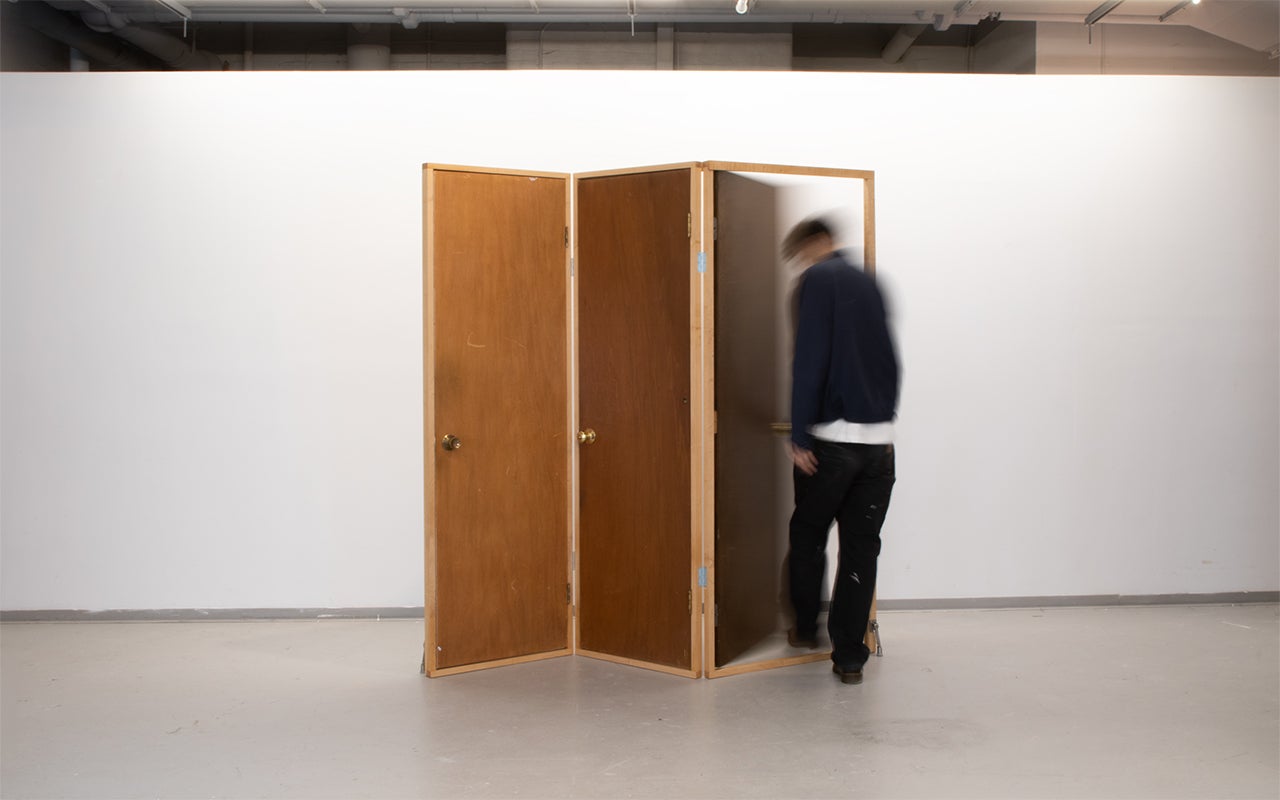 Door Room Divider is a room divider constructed from doors. You can open each doors and it leads you to the same space. 