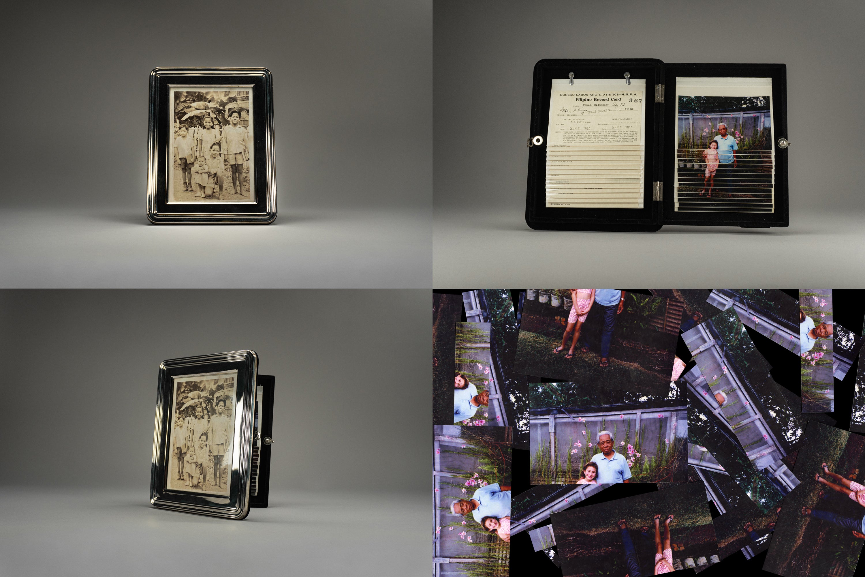 Archival display objects: vintage metal frames holding historical sepia photographs, hinged document case with record card, and scattered overlapping color prints arranged in tiled patterns.