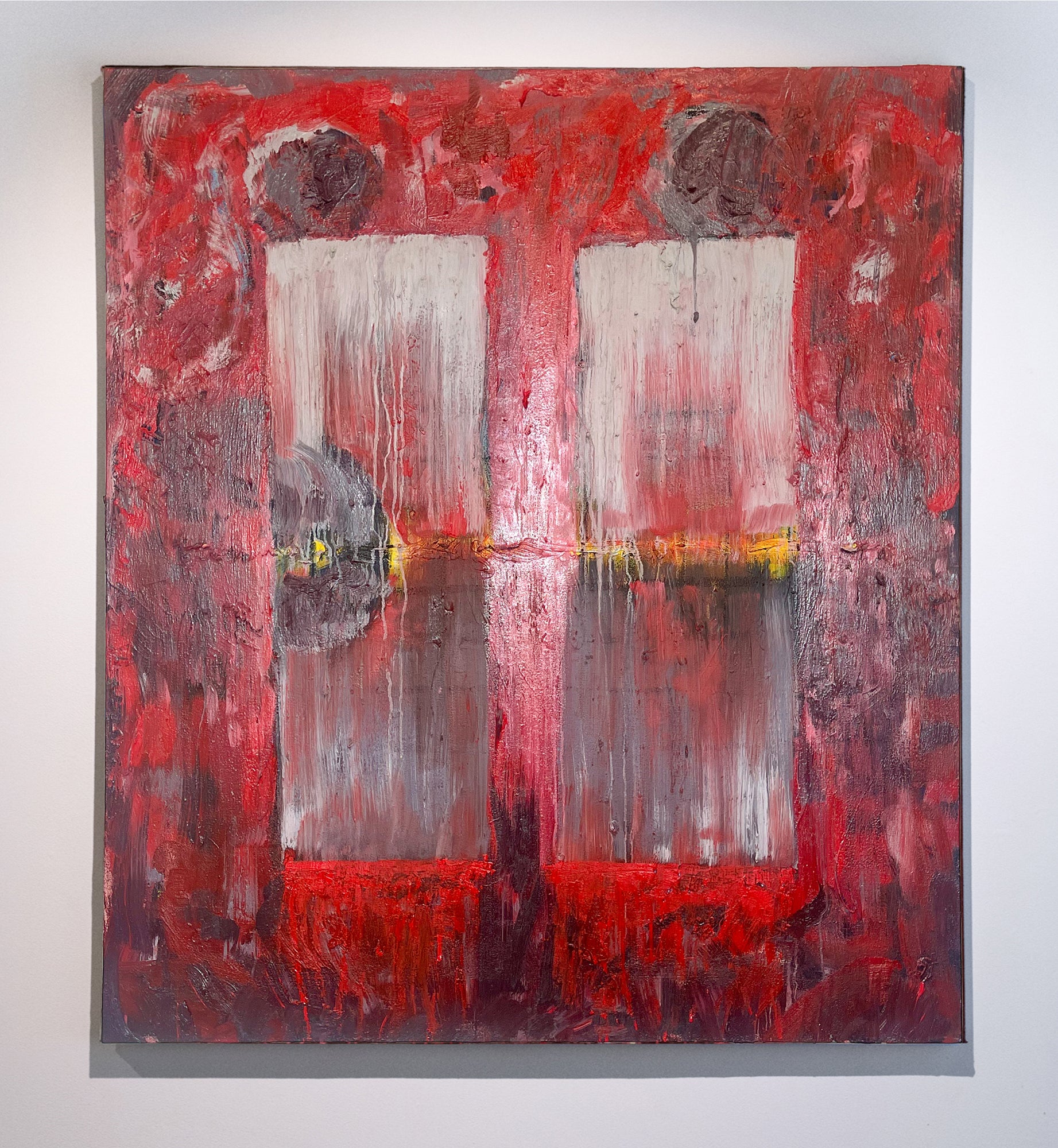 Red abstract painting with two pale vertical window-like forms, gray circular shapes, a thin yellow horizontal glow, heavy texture, and paint drips across the surface.