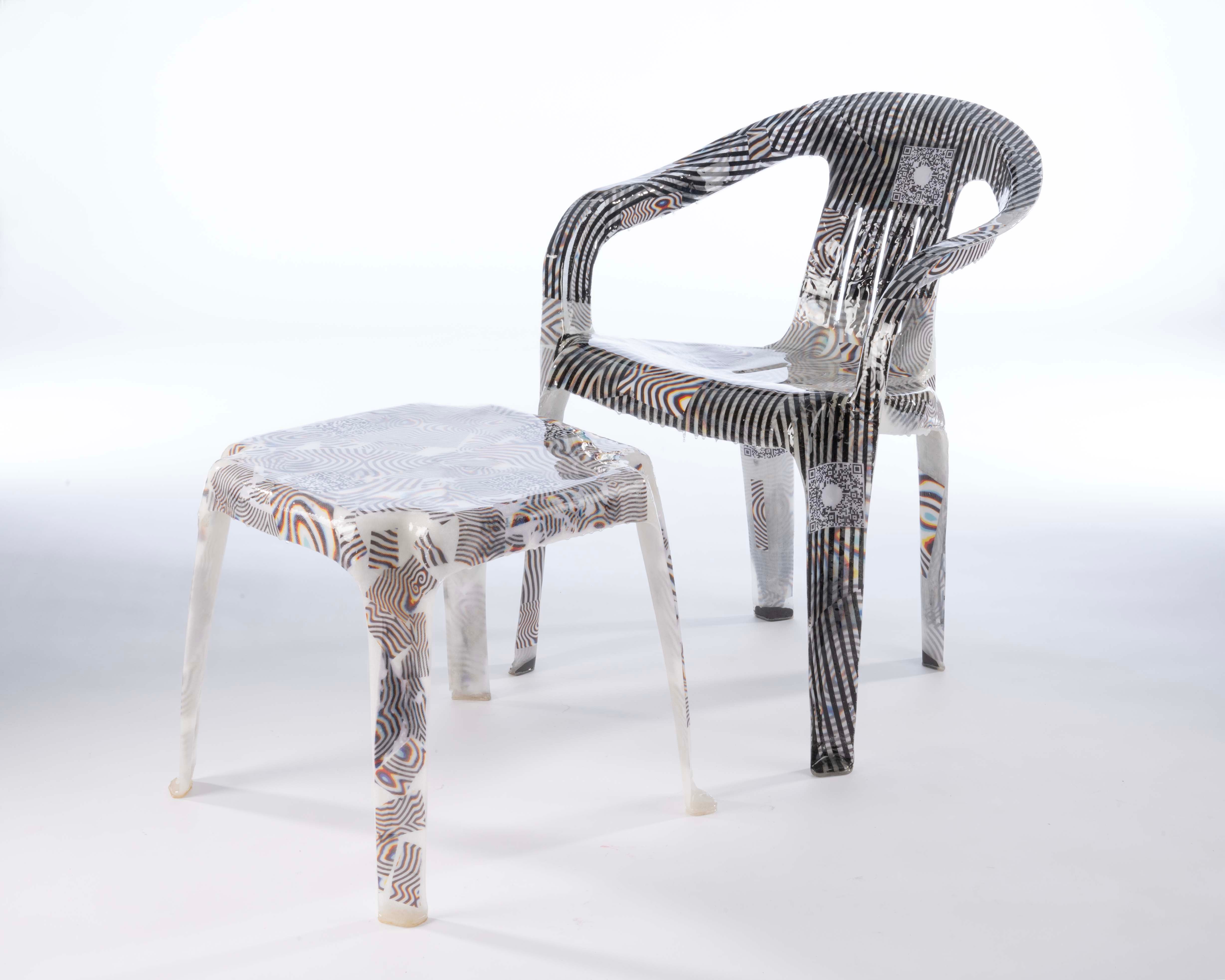 Glossy semi translucent fiberglass lawn chair and side table with funky psychedelic patterns embedded within.