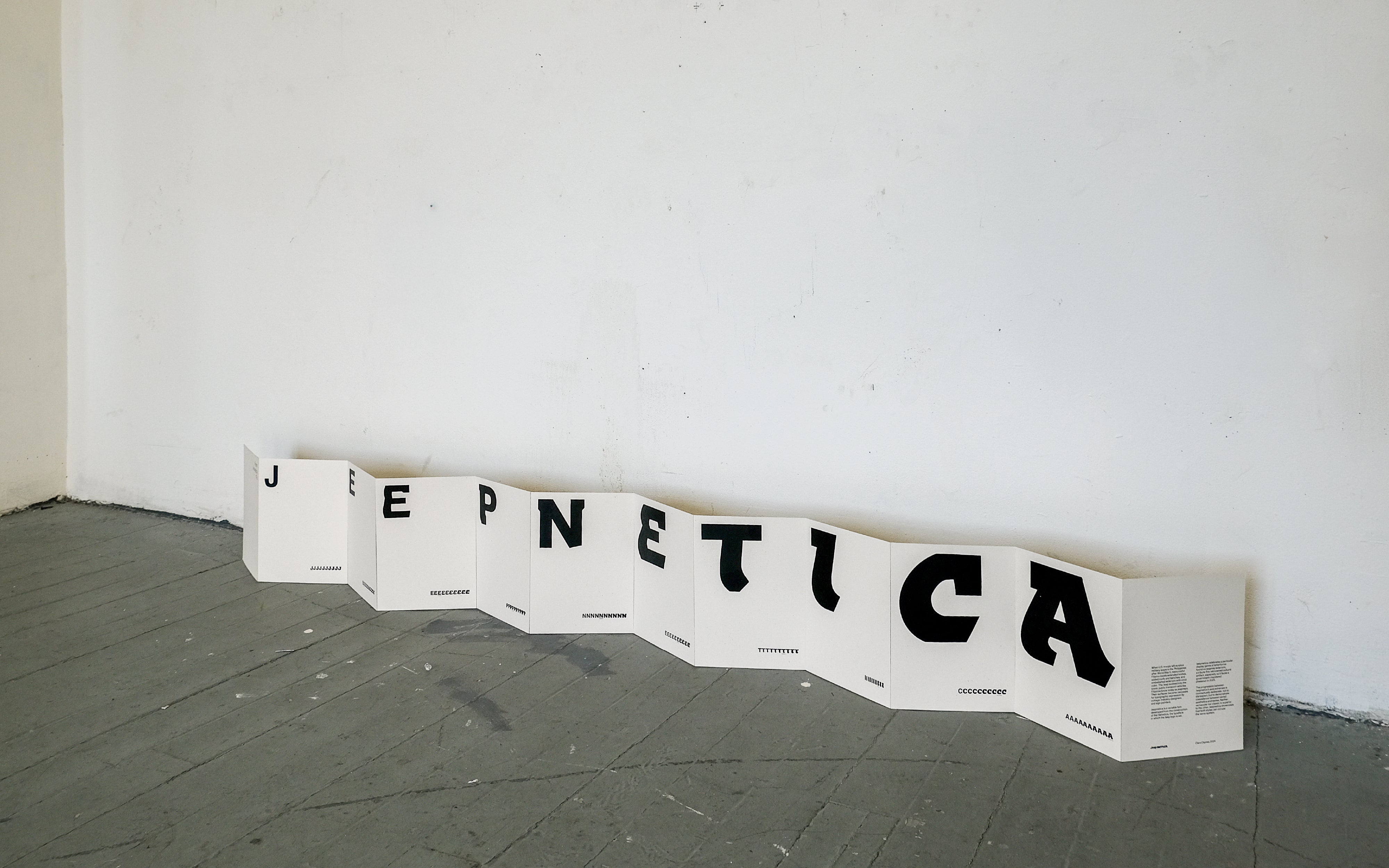 Accordion-fold book showing the progression of the Jeepnetica variable typeface across its weight/width axes.