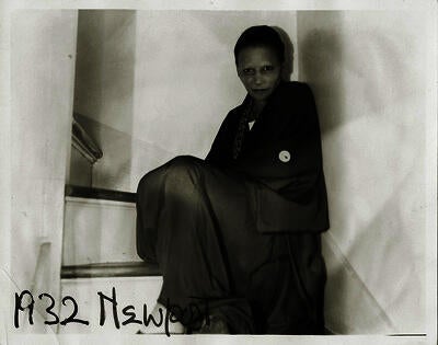 Nancy Elizabeth Prophet sitting in a stairwell