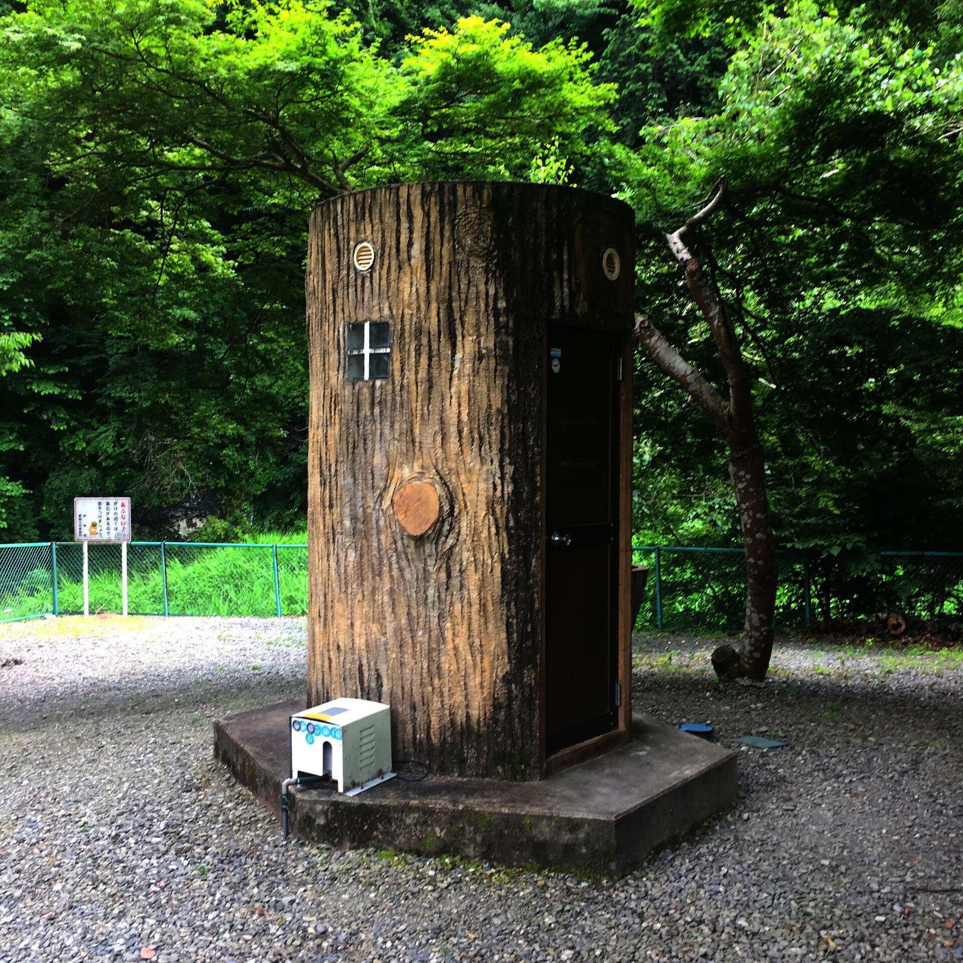 Utility shed made to look like a large tree stump