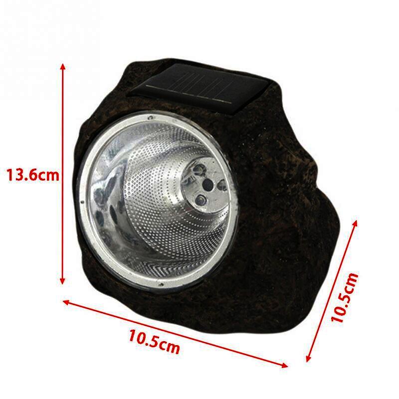 solar-powered LED light made to look like a rock