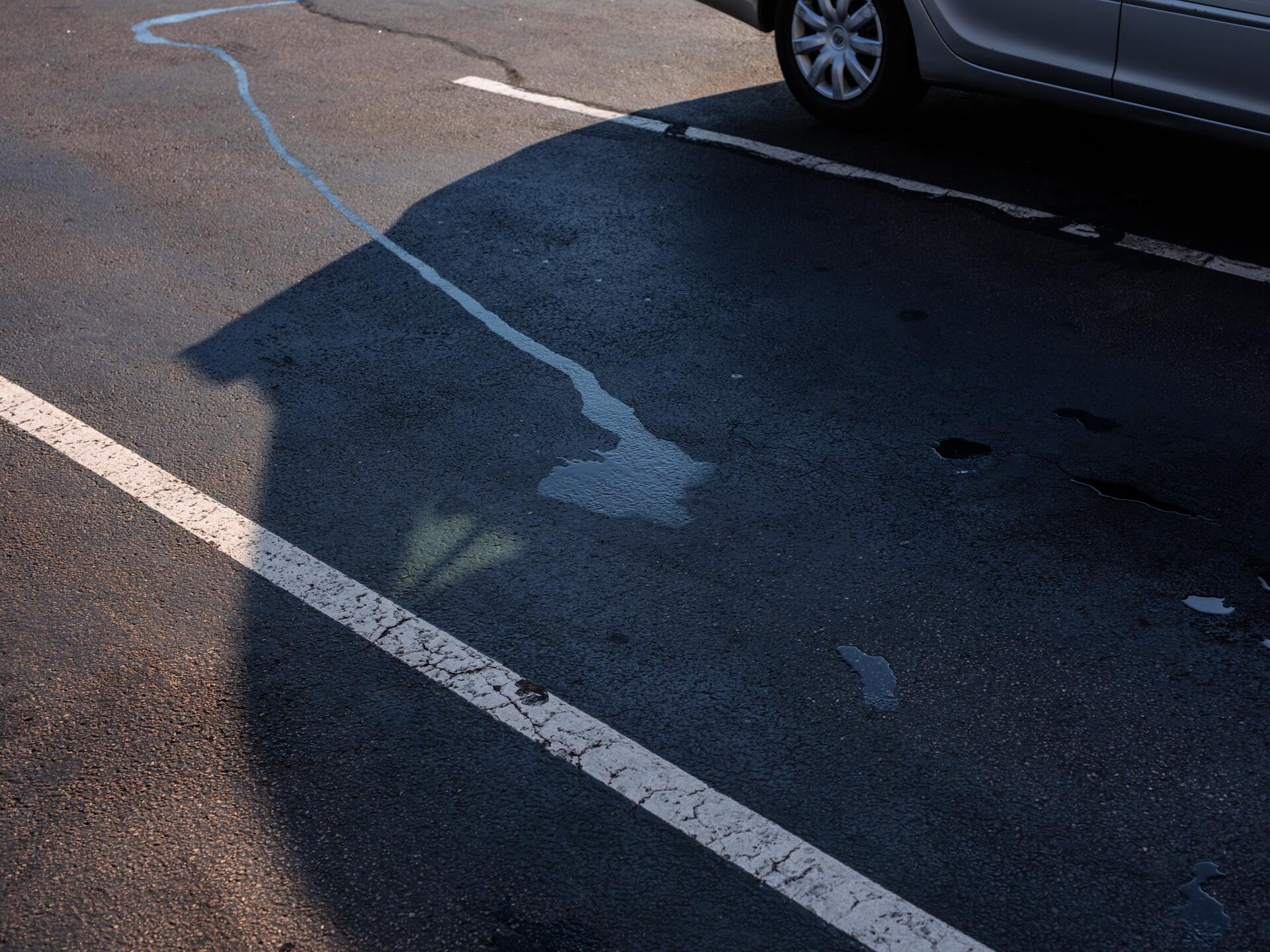 oil leak on parking lot
