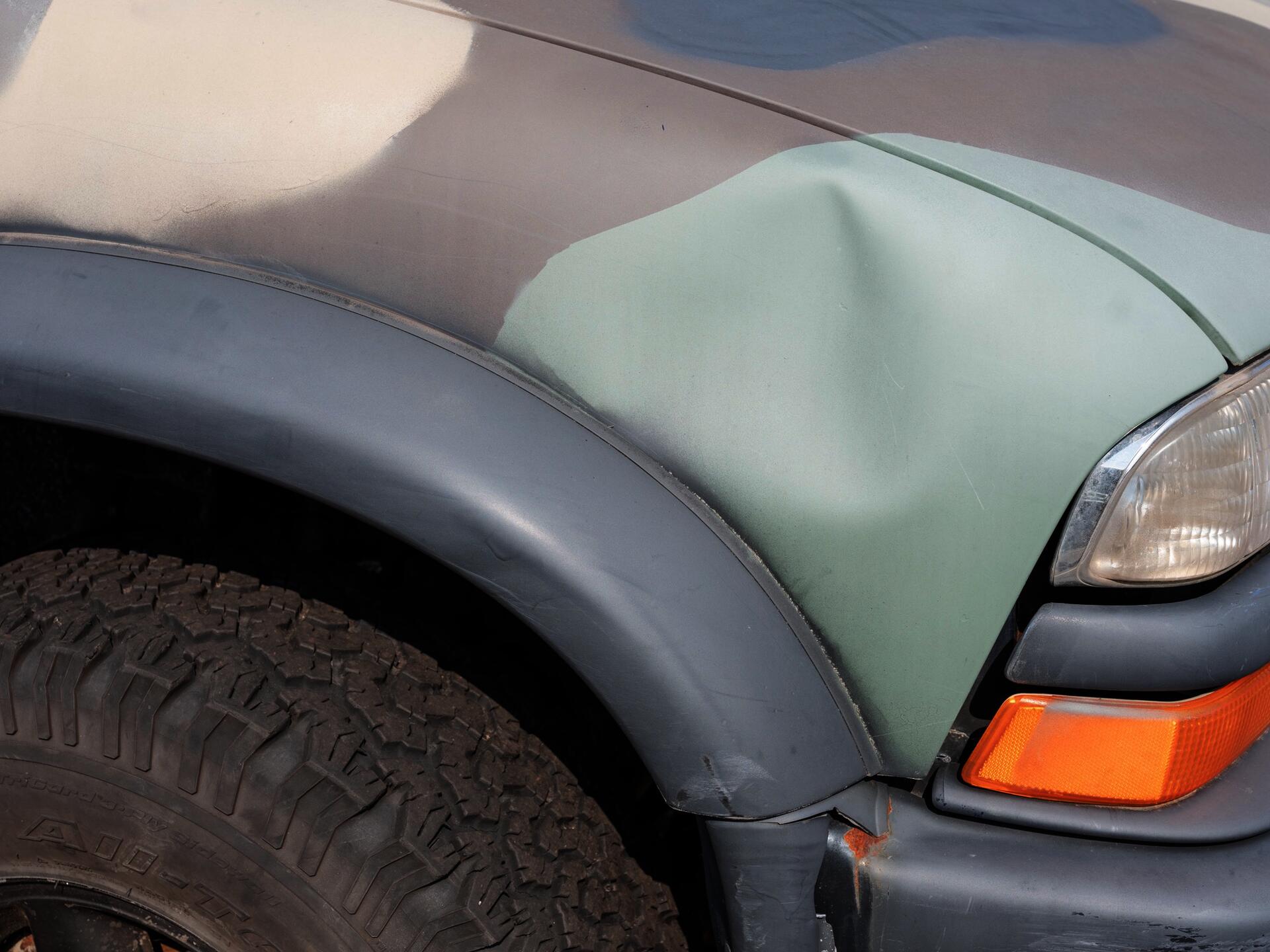 dent in car