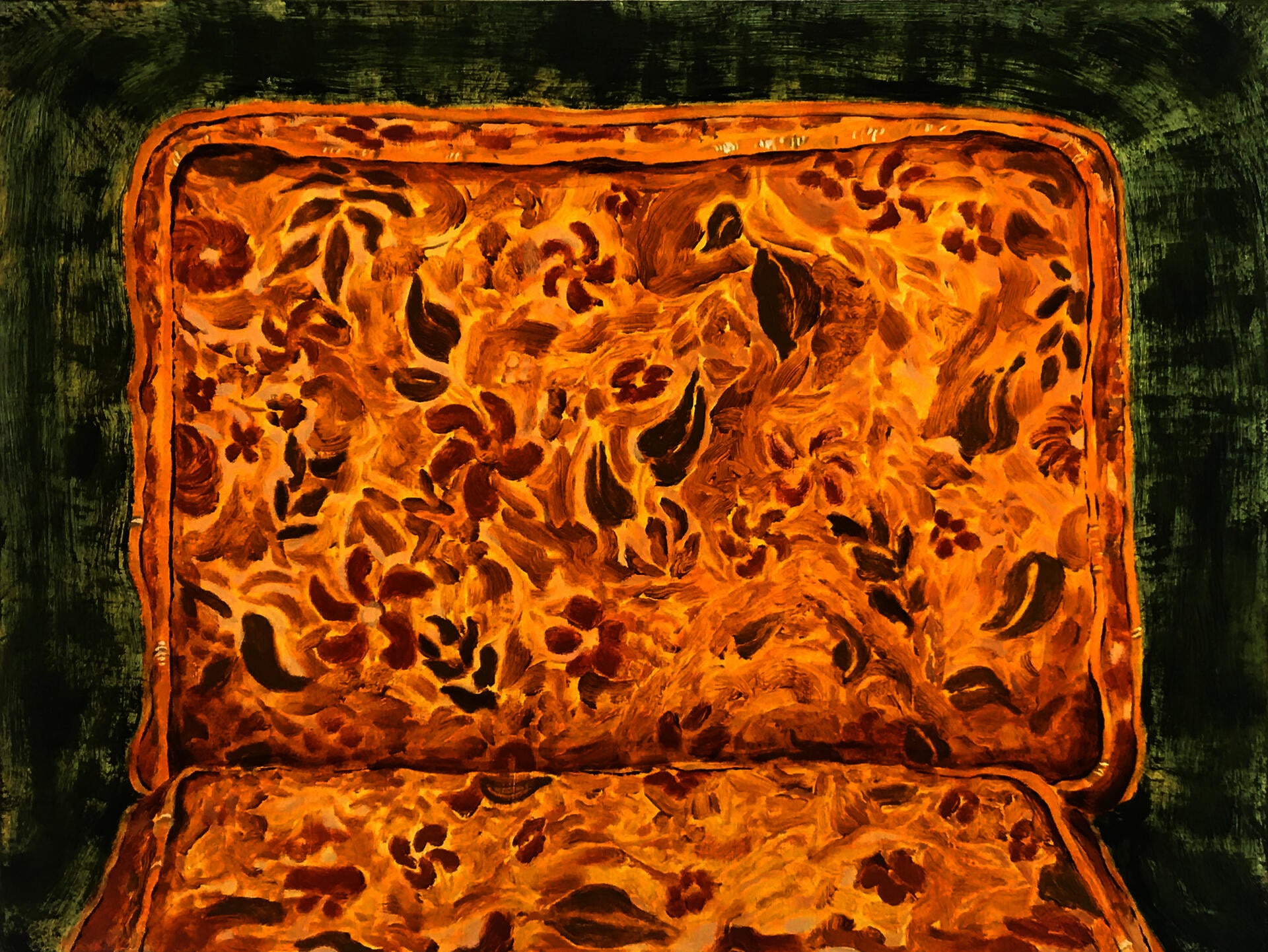 close up of a yellow chair with floral pattern