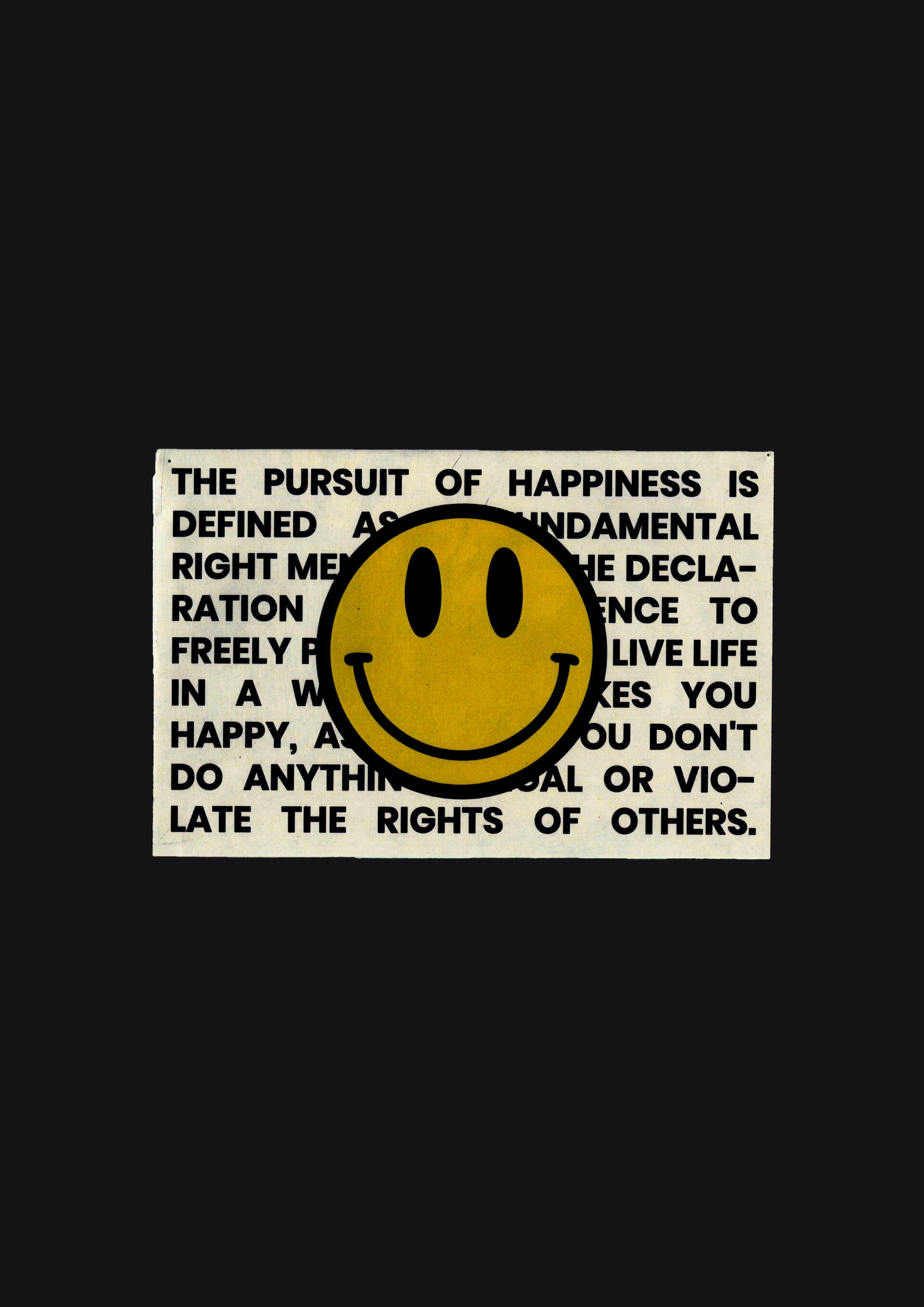 Smiley face graphic with text behind