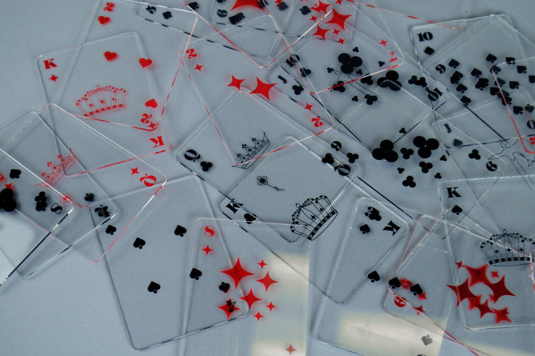 52 illustrative playing cards, made to always win...or lose