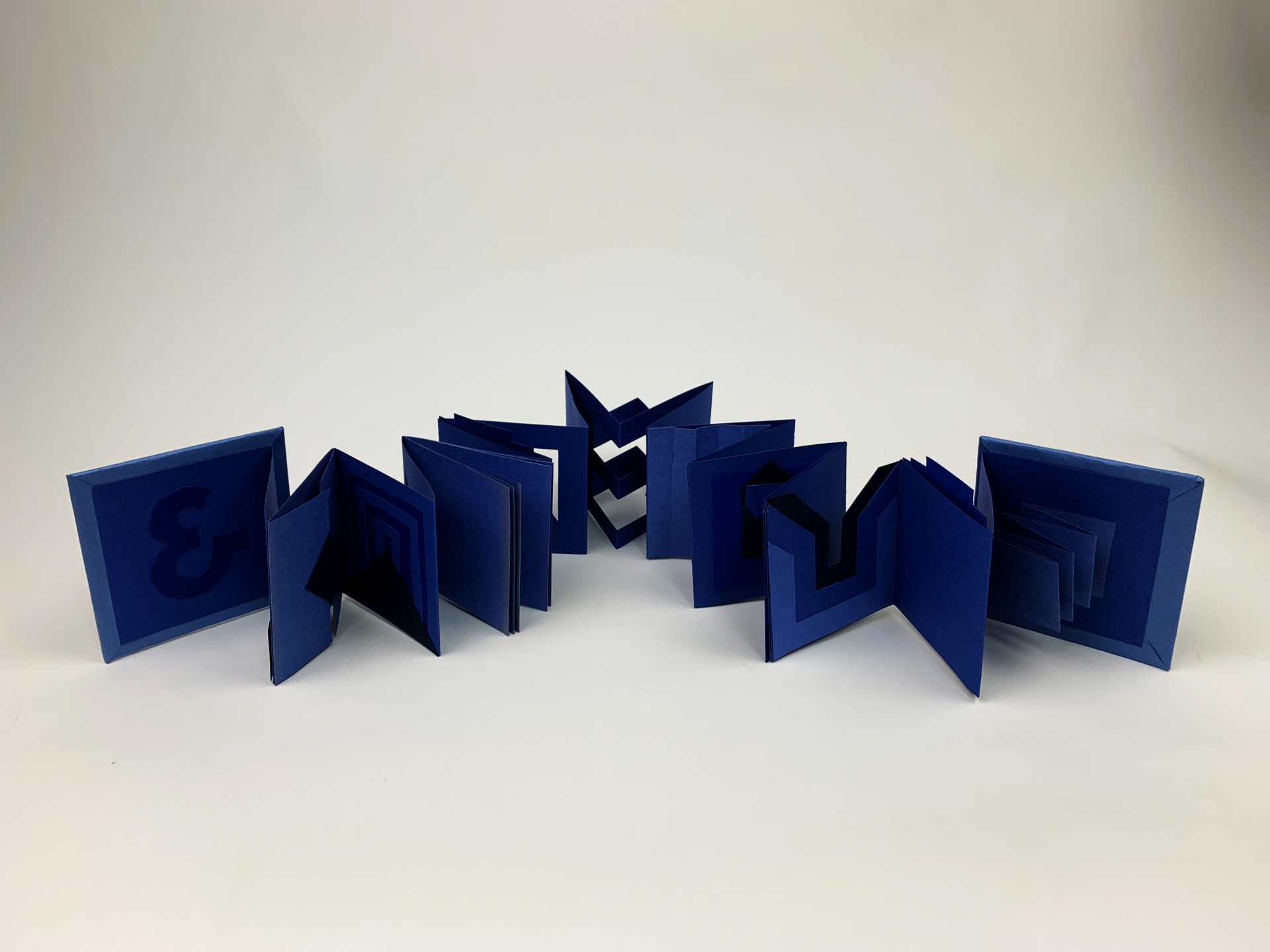 Folded blue accordian paper
