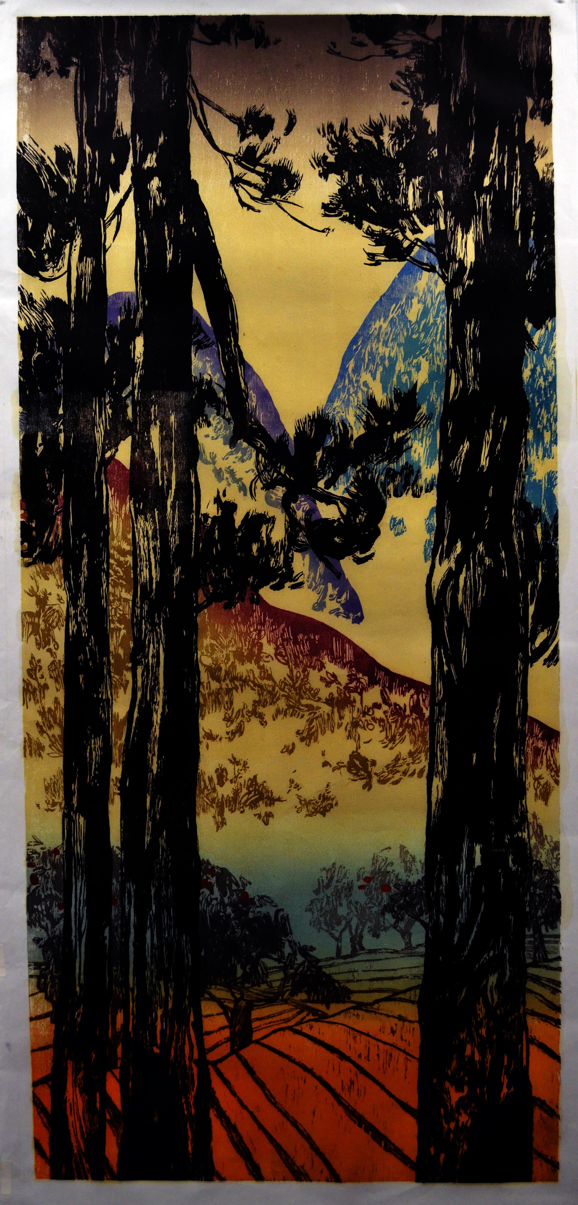 a collage of peach trees, with mountains in the background