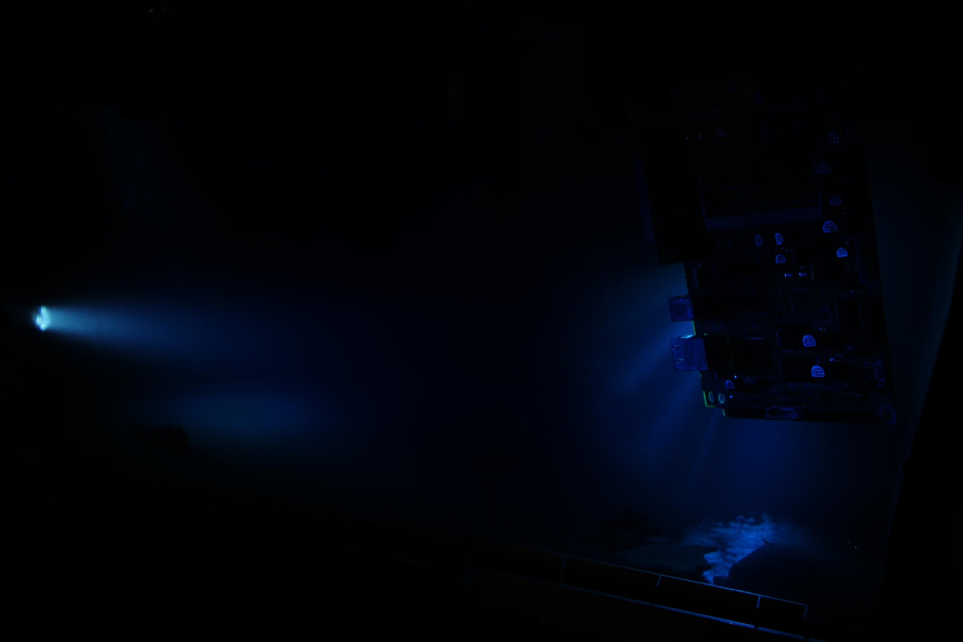 circuit board in blue liquid