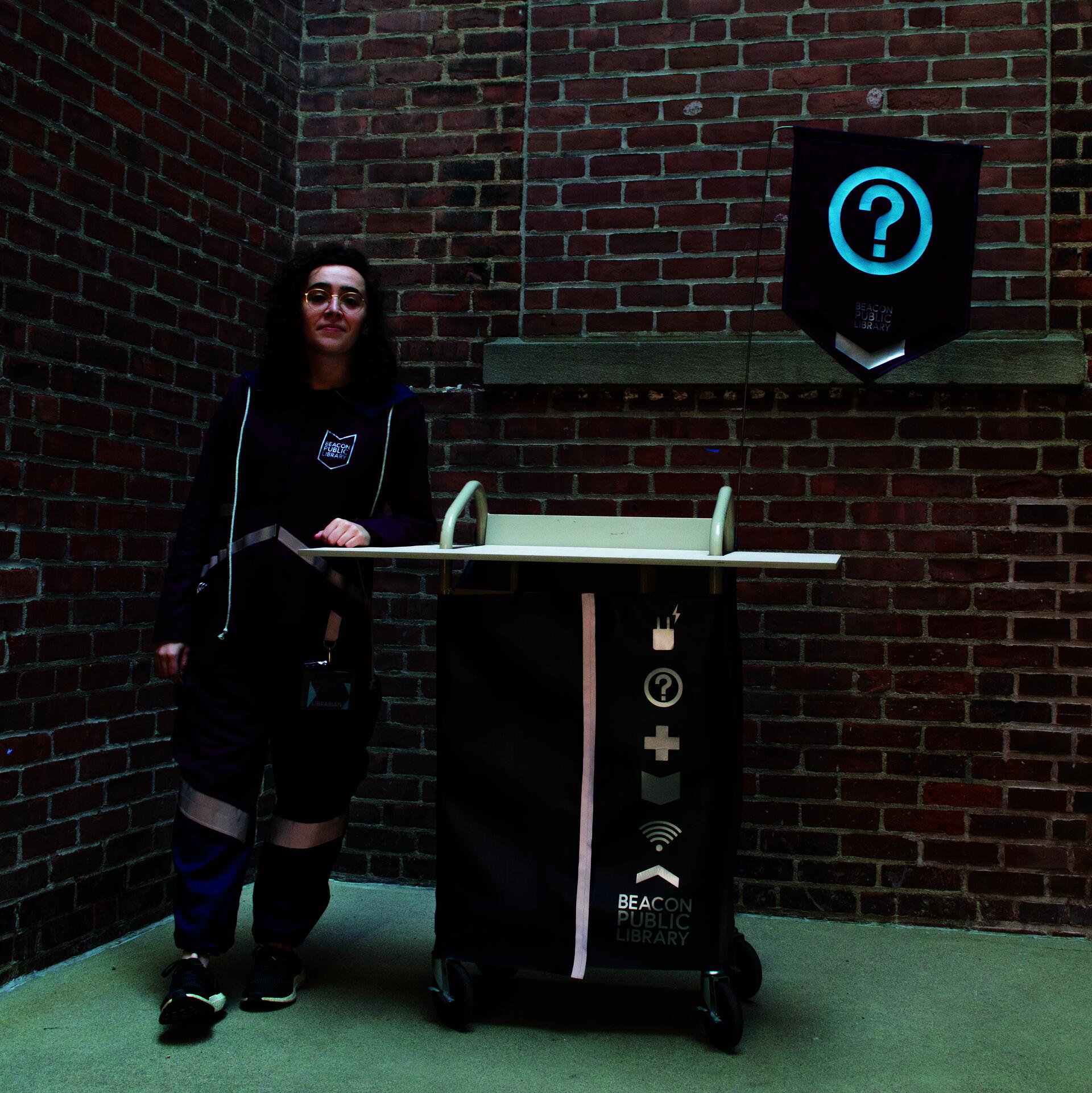 Library cart and librarian in uniform
