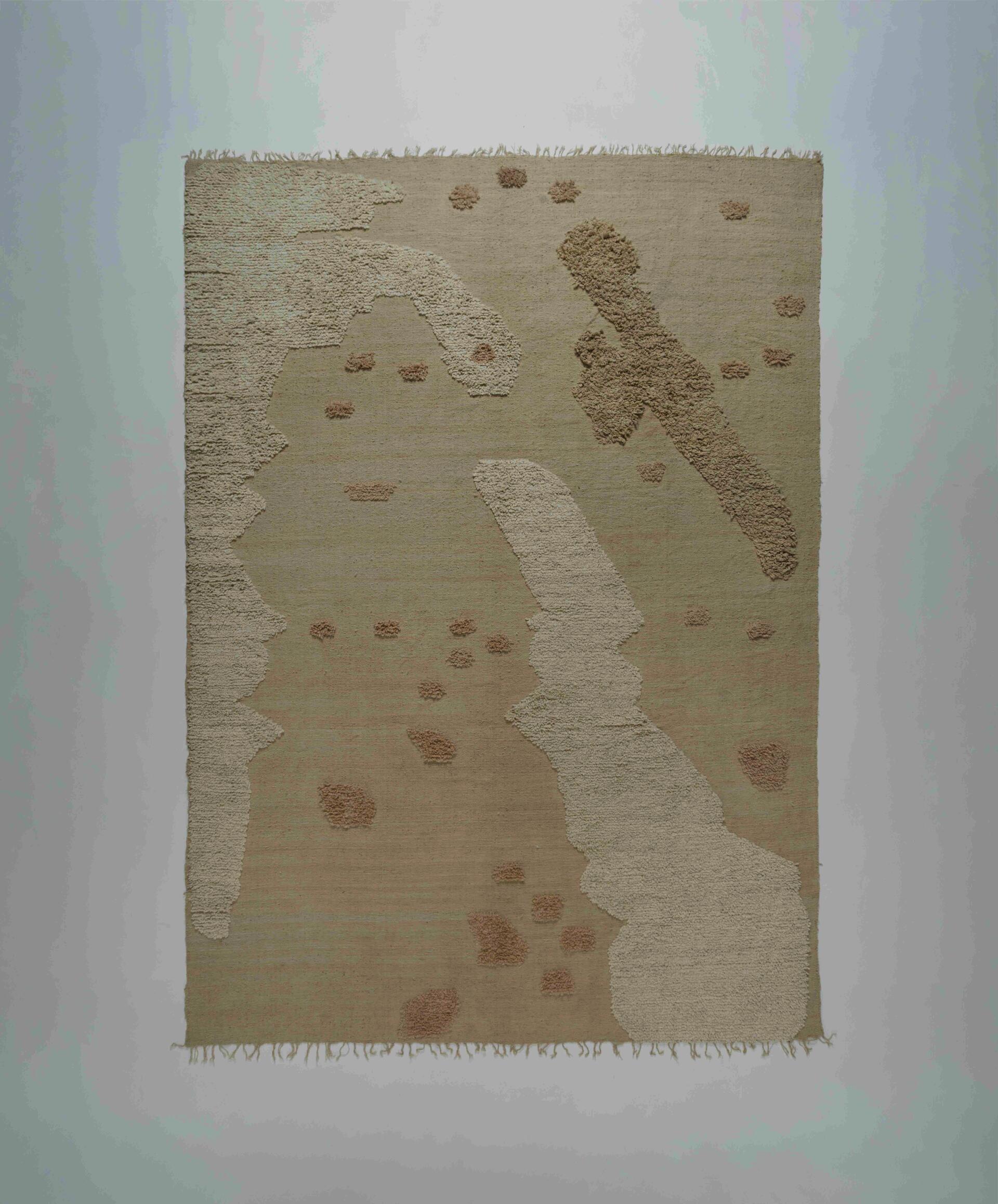 Picture of Wool Rug ''Loose Threads'' Organic shapes that are made with different weaving techniques