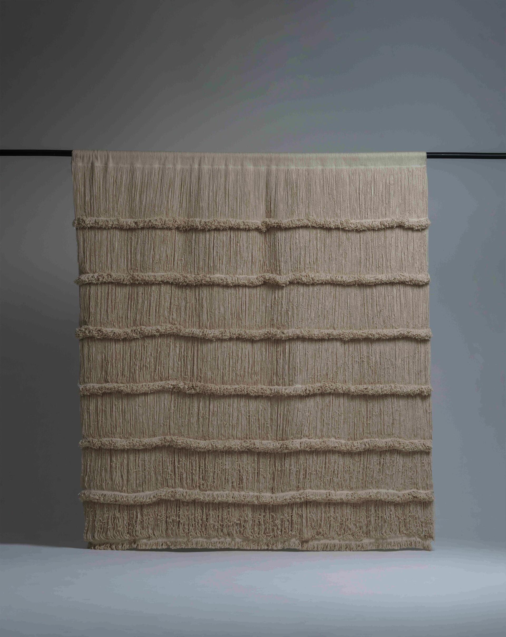 Weaved cotton curtain hanging from rod final picture