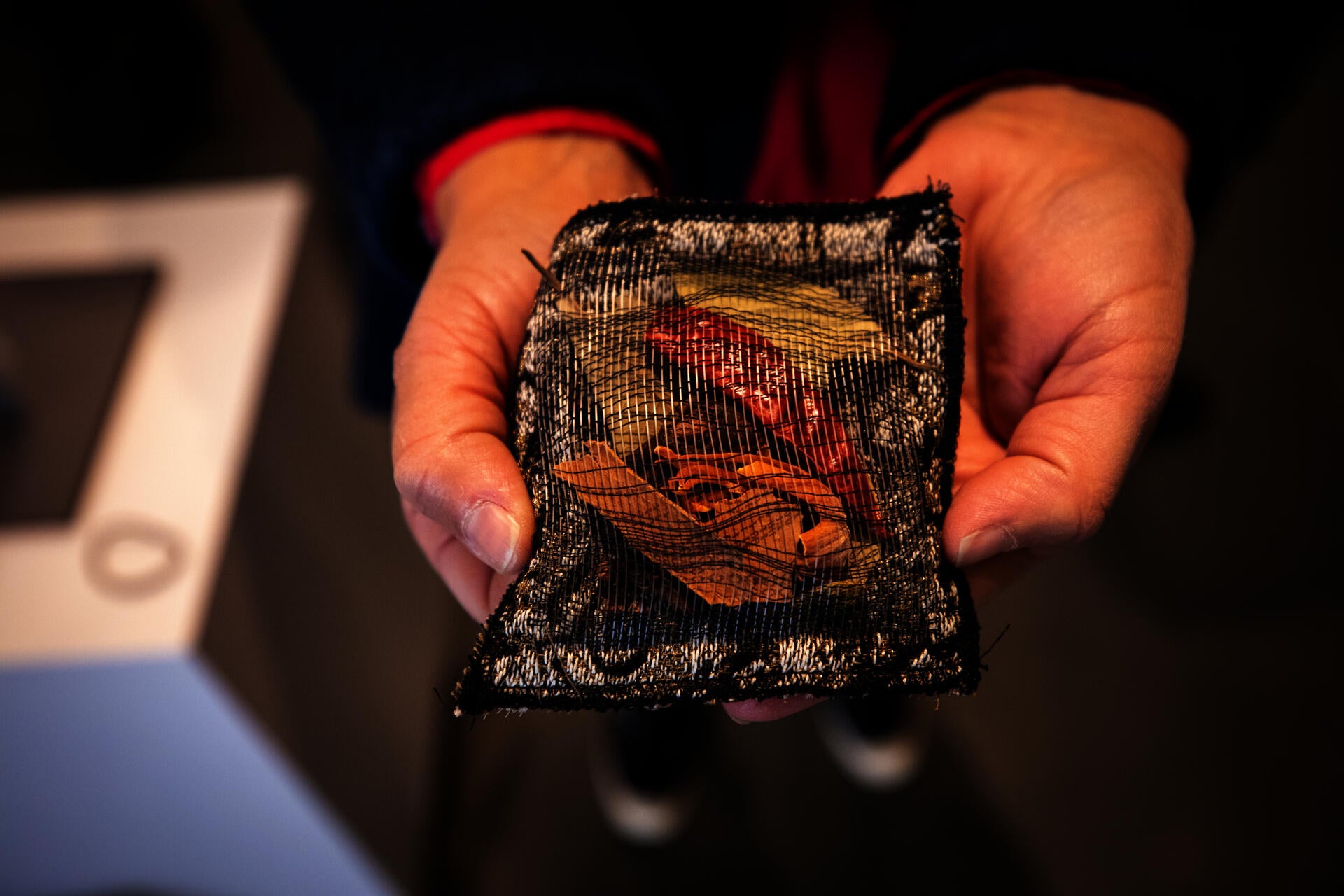 image of Jacquard pouch with spices being held 