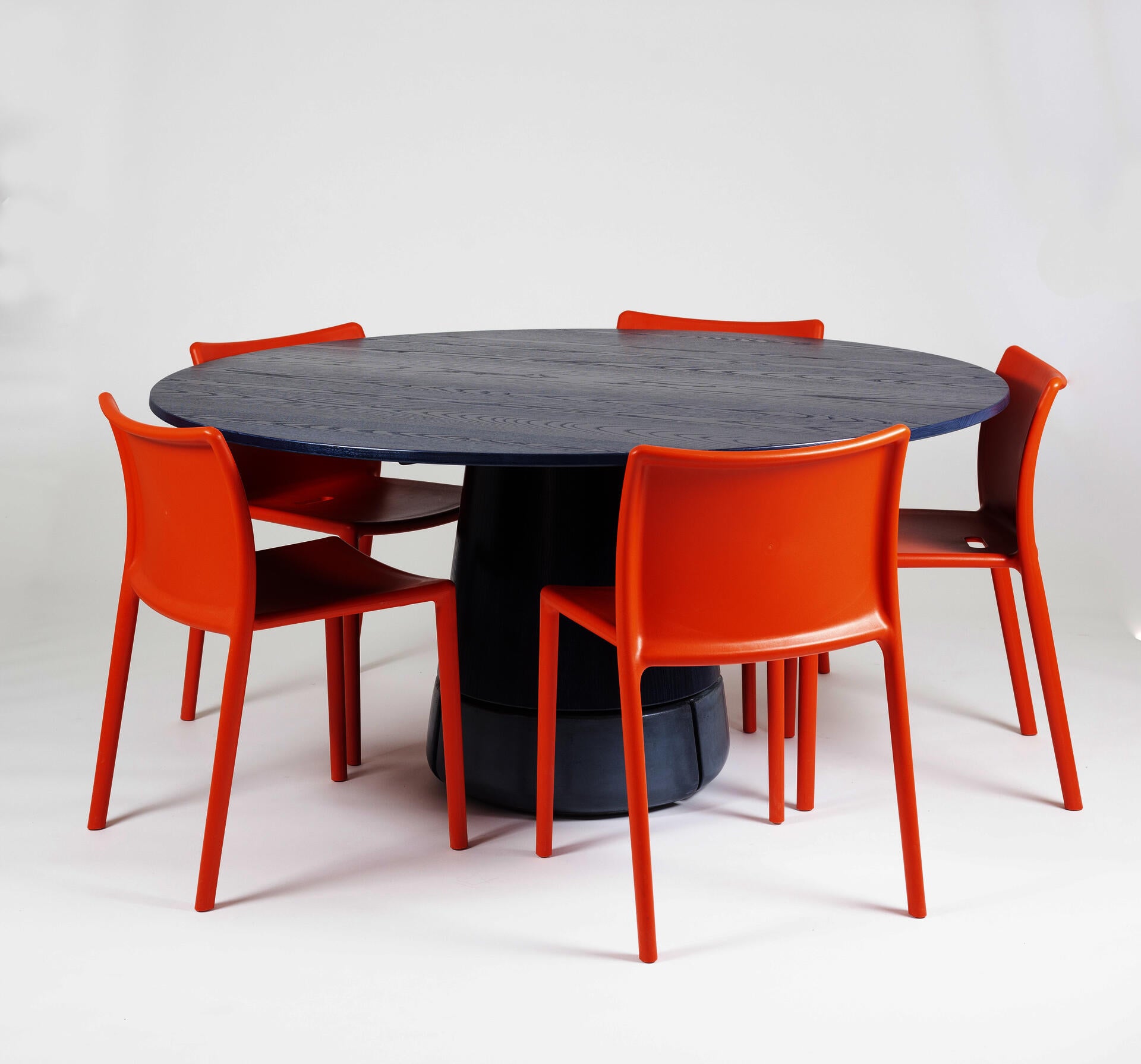 Orange Chairs around Blue Table