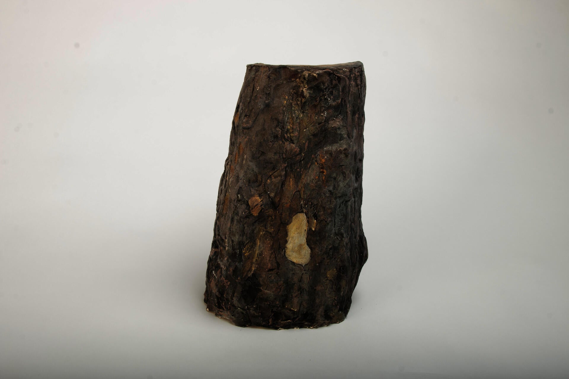 image of ceramic piece resembling a tree trunk