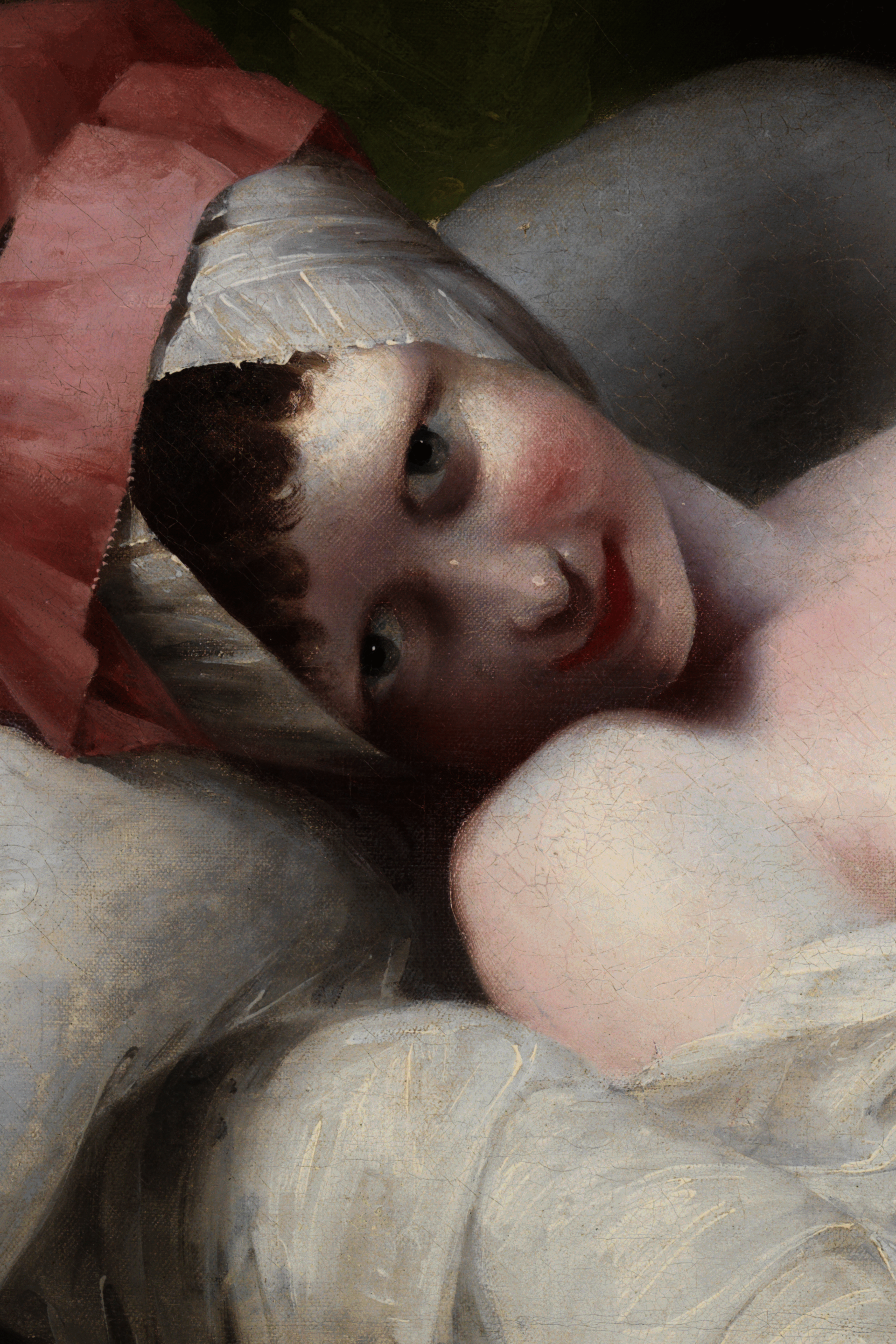 Painting of a very light-skinned young woman, lying in bed, making intense, suggestive eye contact with the viewer. Her breasts are exposed and she wears a pink and white headcovering.