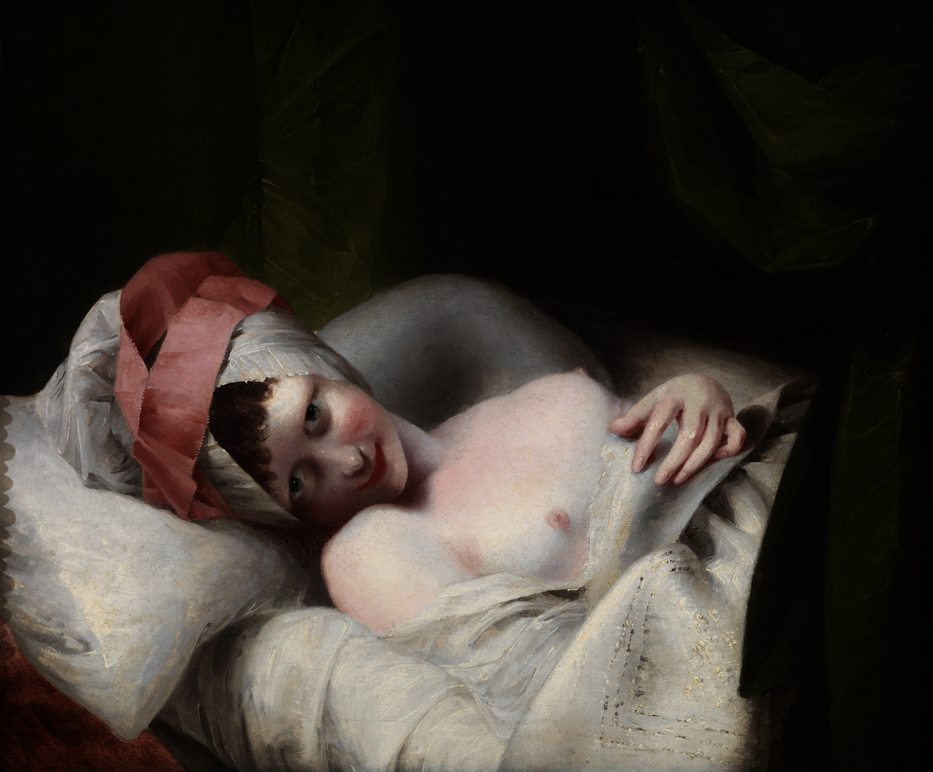Painting of a very light-skinned young woman, lying in bed, making intense, suggestive eye contact with the viewer. Her breasts are exposed and she wears a pink and white headcovering.