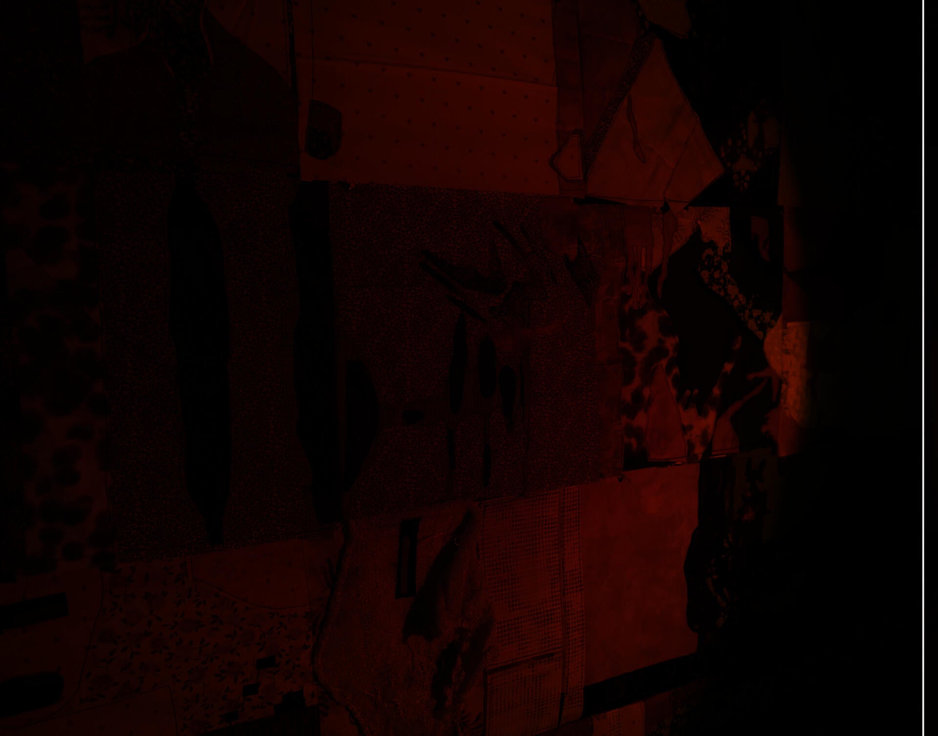 A quilt is pinned to a wall, many different patterns and colors form strange organic and geometric forms. A circle of warm light floods the quilt, it feels like a quiet, early morning in the mountains. On the edge of that circle, the quilt quickly dissolves into darkness.