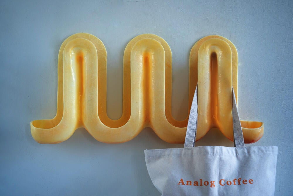 Three yellow swells in a line.