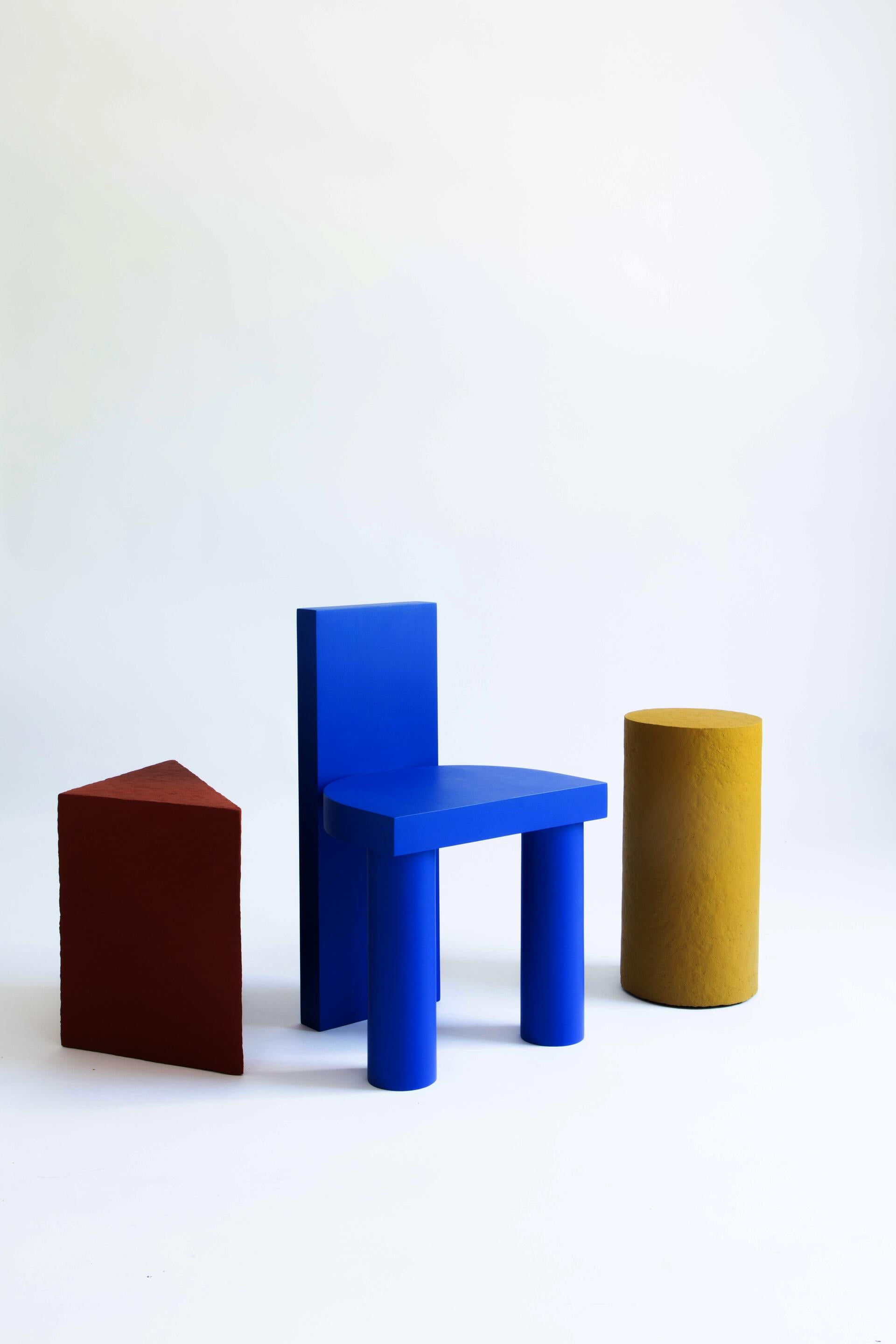 Solid wood chair, painted blue with two paper maché side tables.