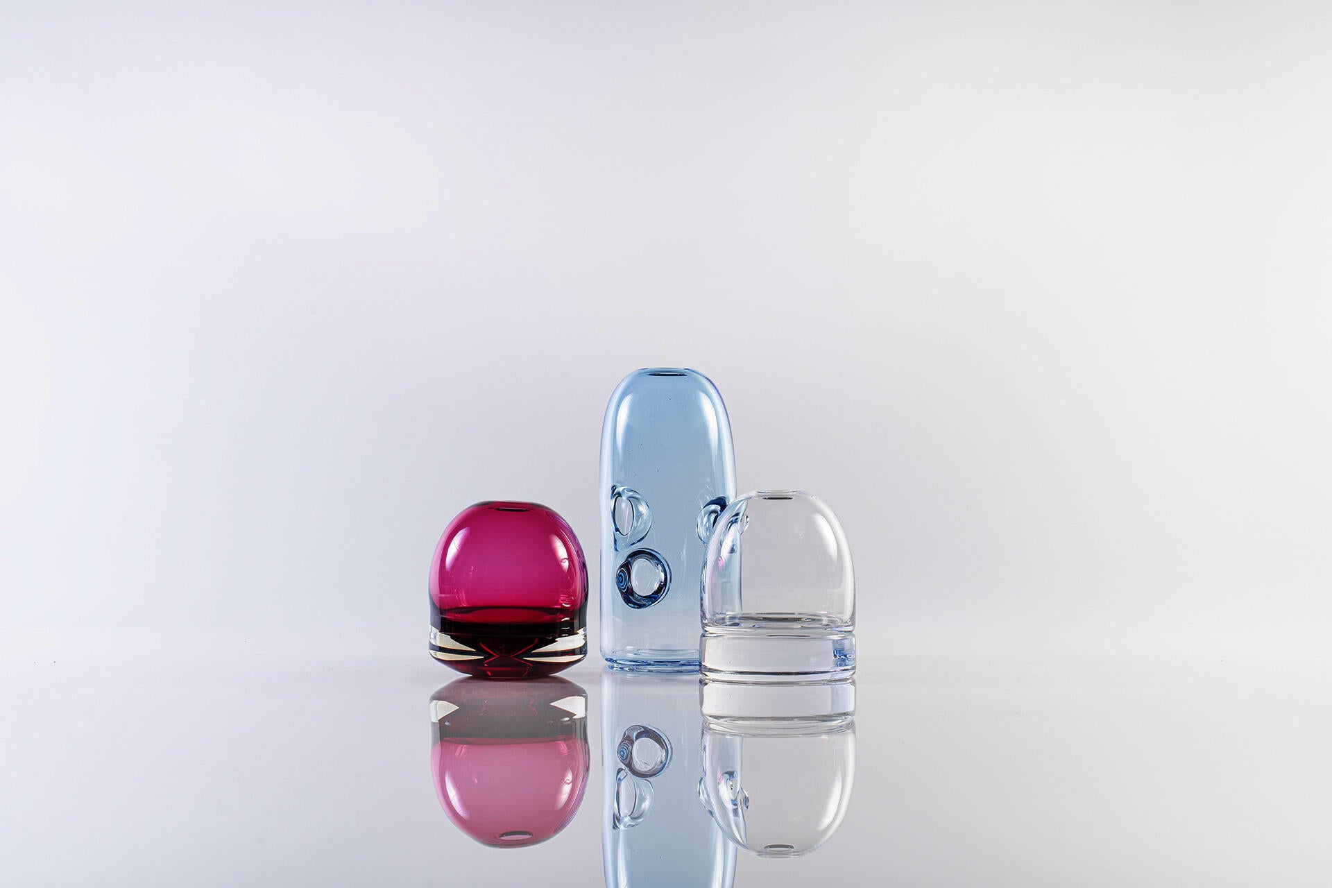 Three hand blown glass vase