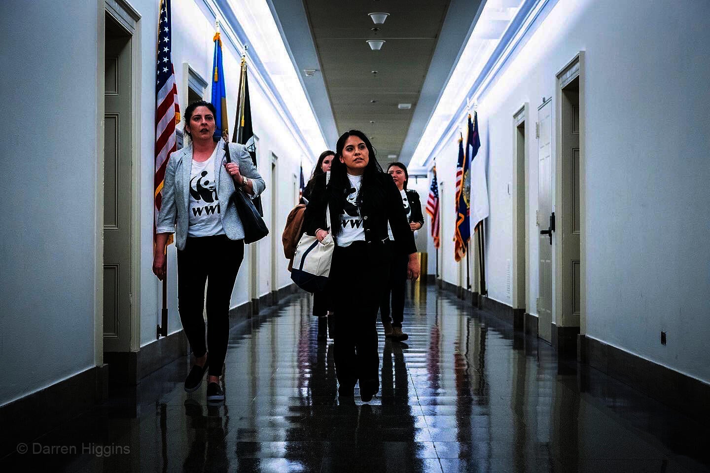 World Wildlife Fund activists walk around Capitol Hill