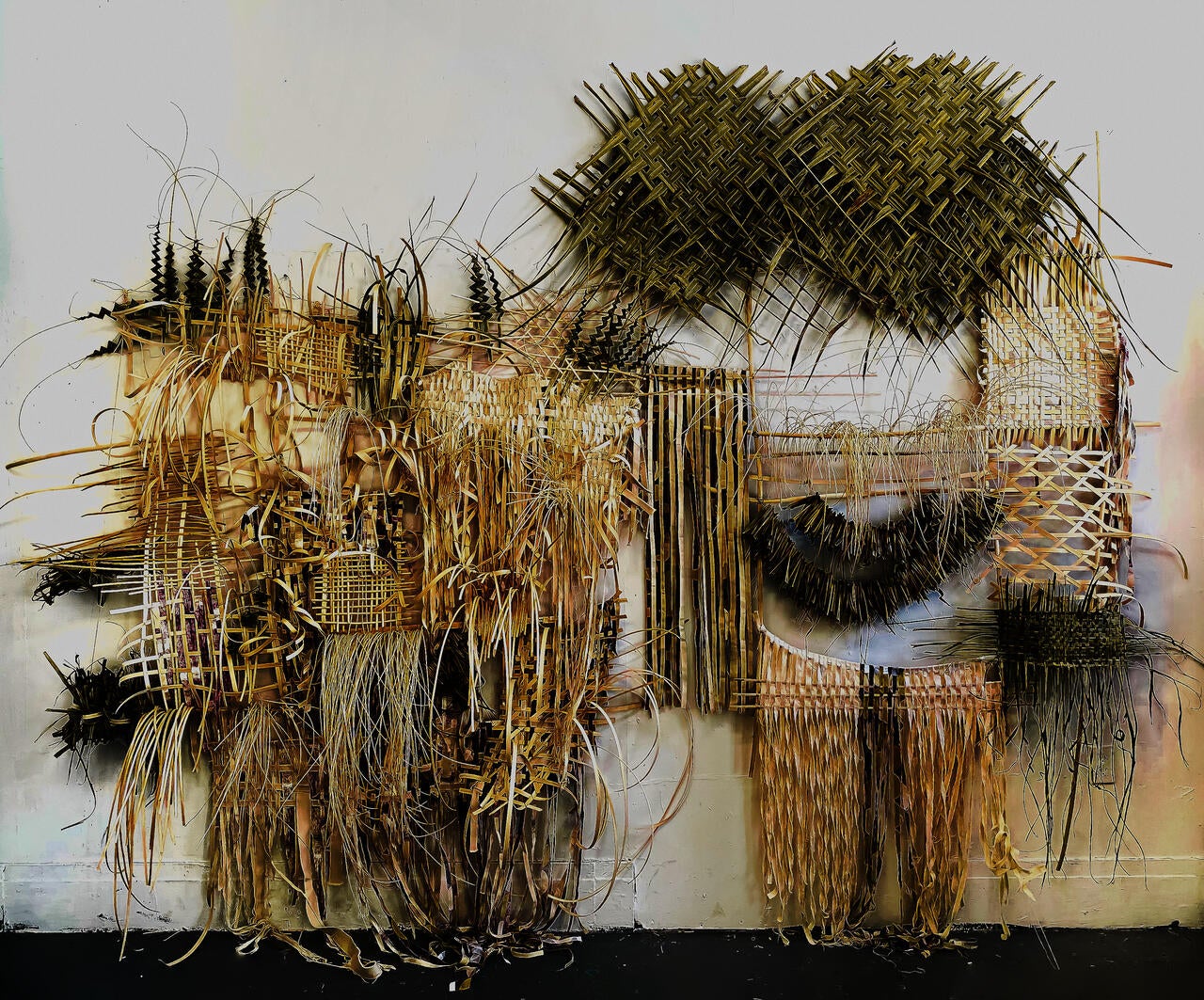Finding ways to demonstrate other forms of "banig" (traditional Filipino woven mats) In the language of paintings, I let each of the tendrils loose and not secured in the matrix of the weaving to represent paint drips.