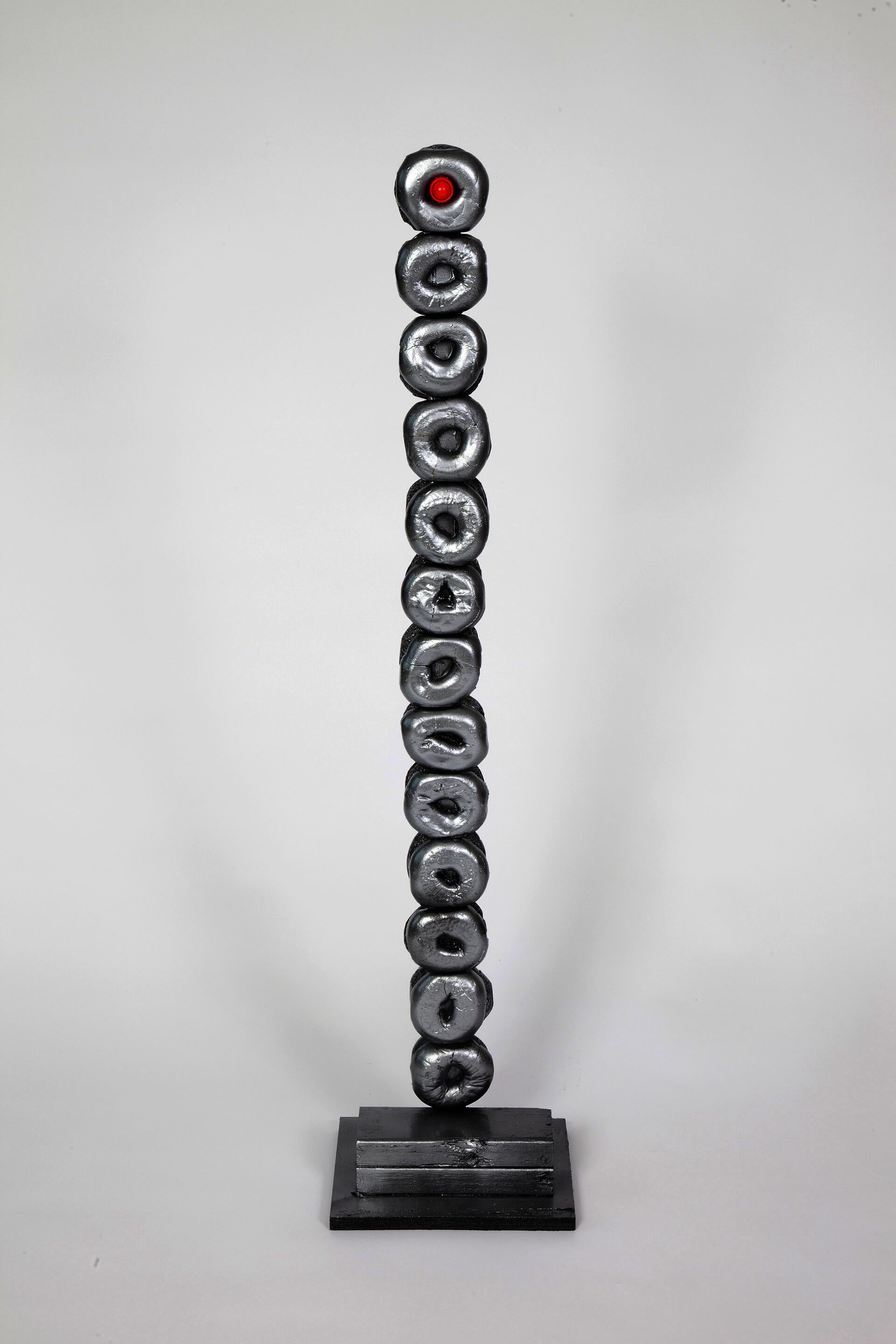 A robotic creature made of bagels